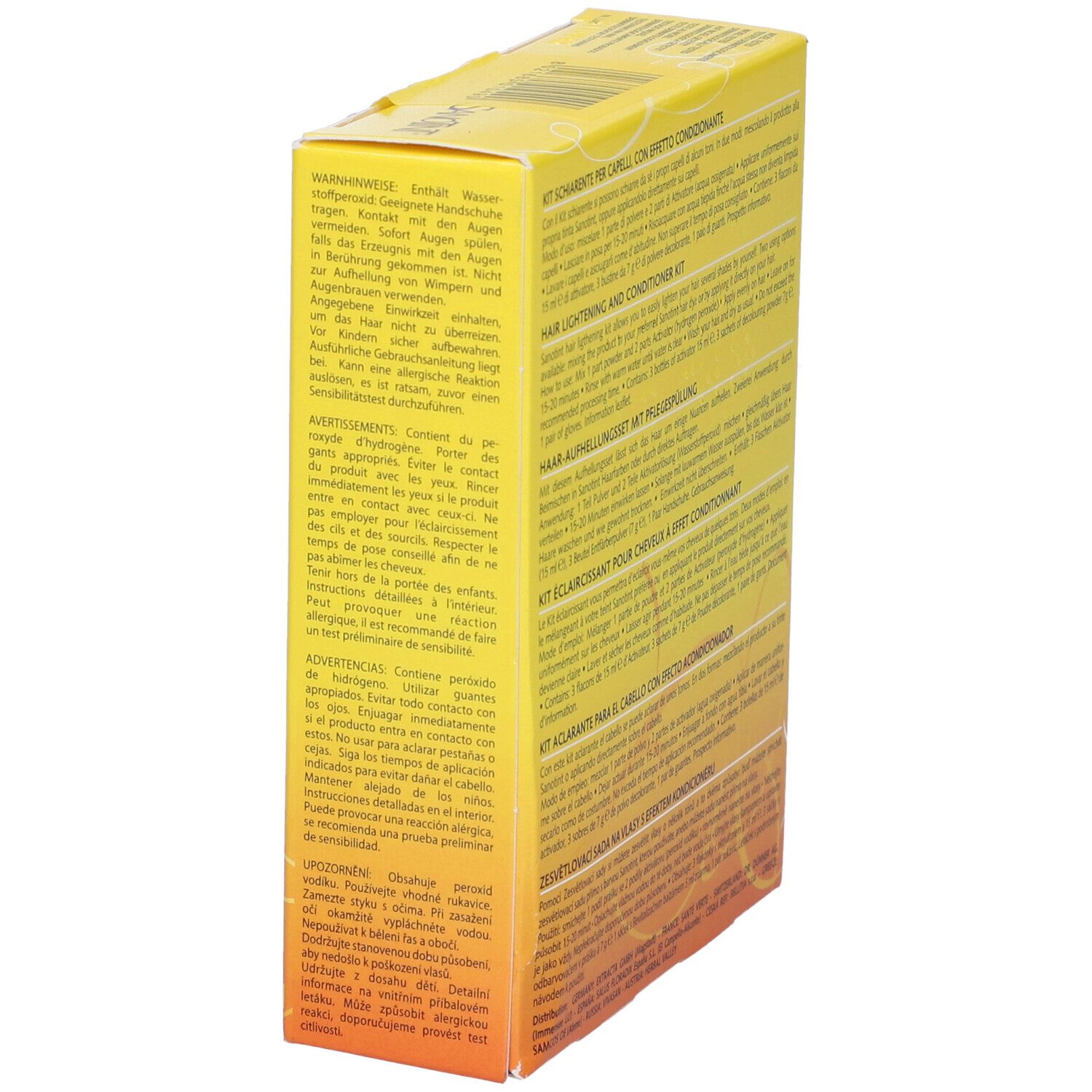 Scatola gialla con testo. Scritto: Kit Schiarente per capelli, 3x7g - 3x15ml.