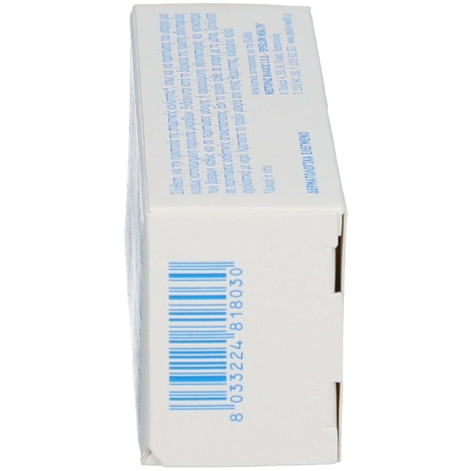 Scatola bianca con codice a barre e testo. Scritta ORAMIL. Testo multilingue.