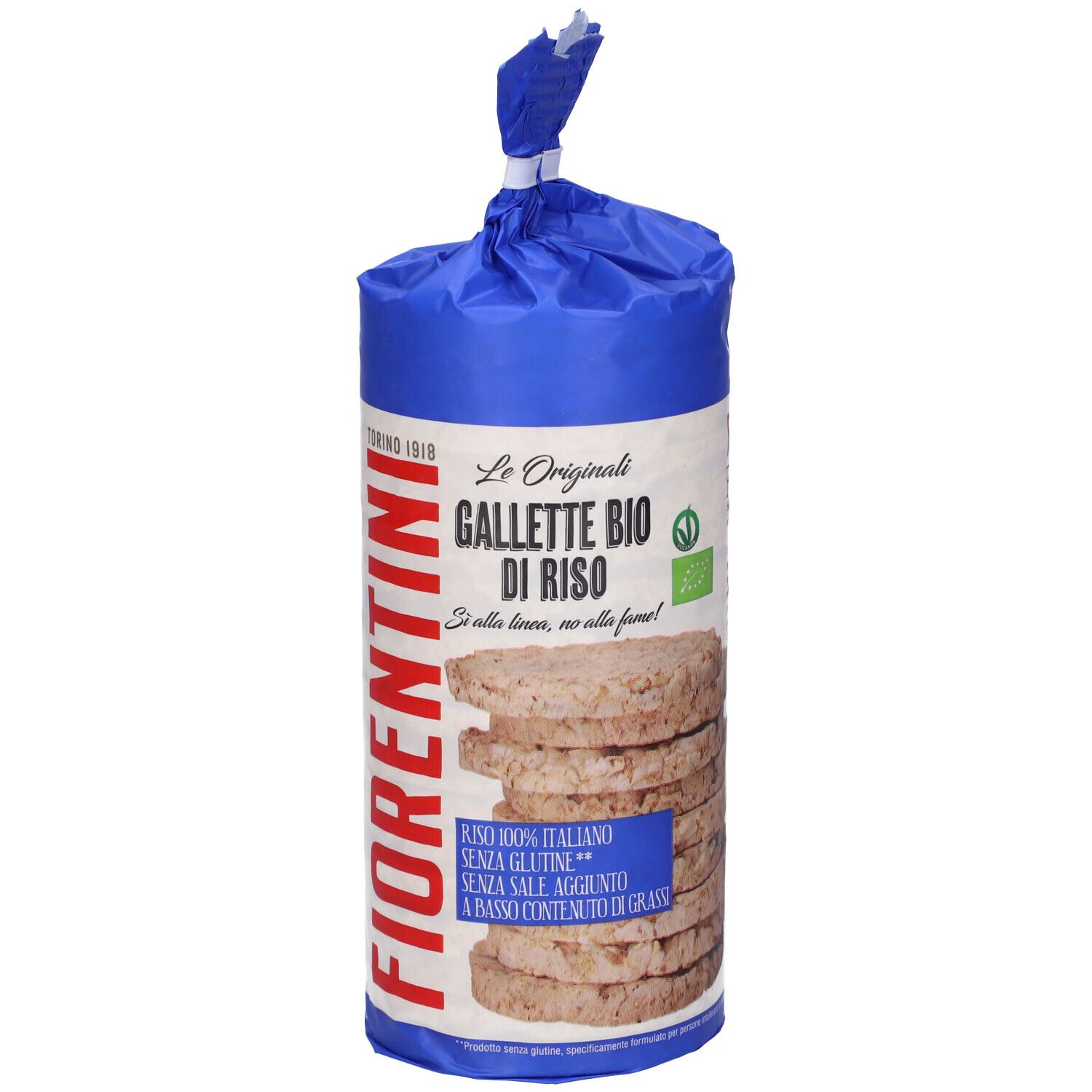 Confezione di gallette di riso. Imballaggio blu e bianco con informazioni sul prodotto. Pila di gallette di riso visibile.