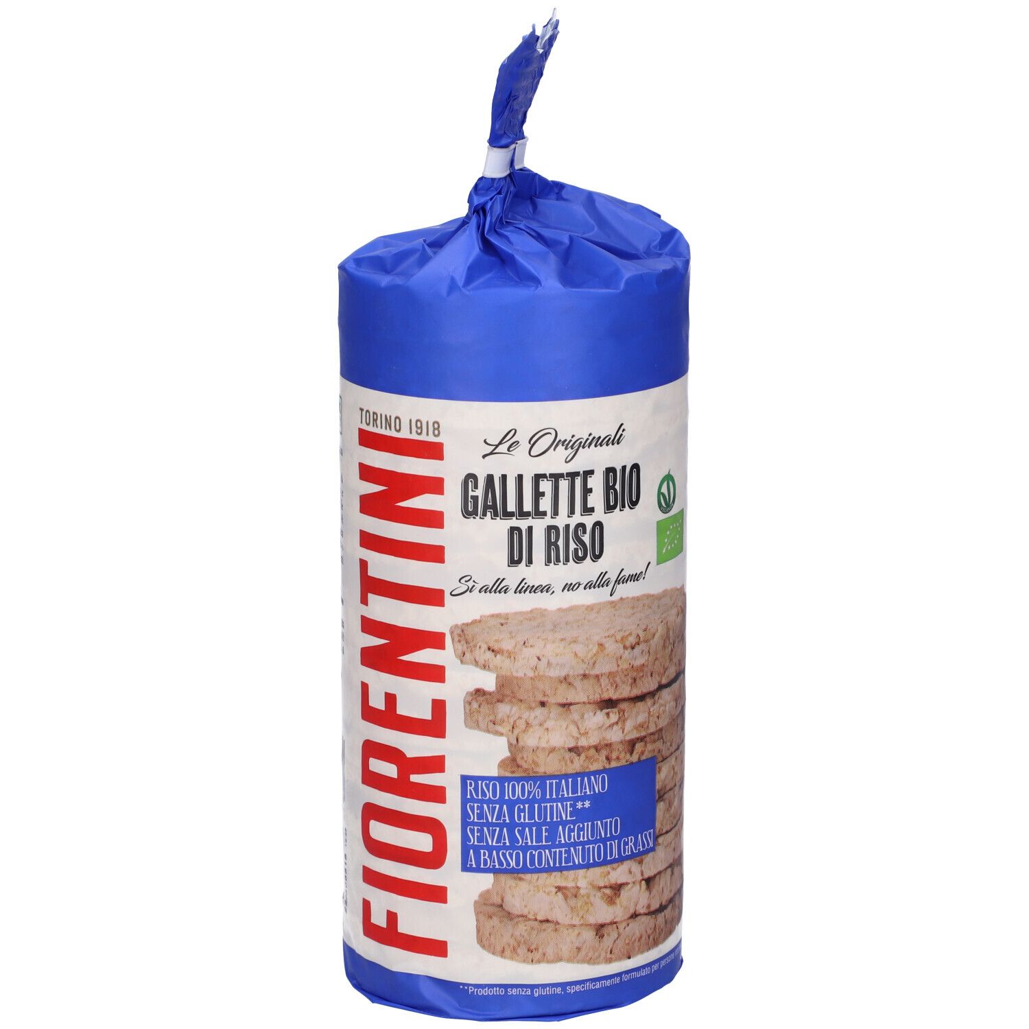 Confezione di gallette di riso. Imballaggio blu e bianco con informazioni sul prodotto. Pila di gallette di riso visibile.