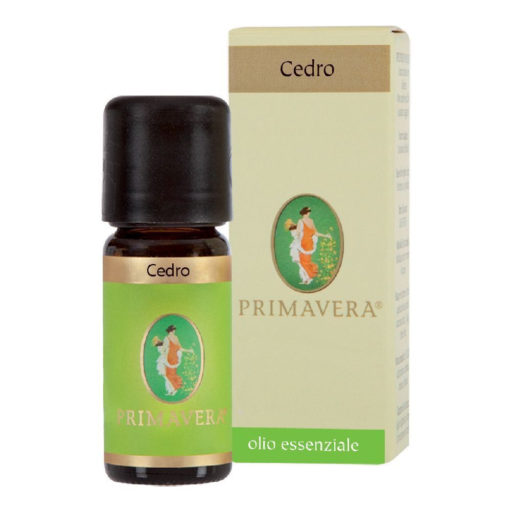 Flacone di vetro marrone con tappo nero ed etichetta verde. Scritta Cedro. Logo Primavera e confezione.