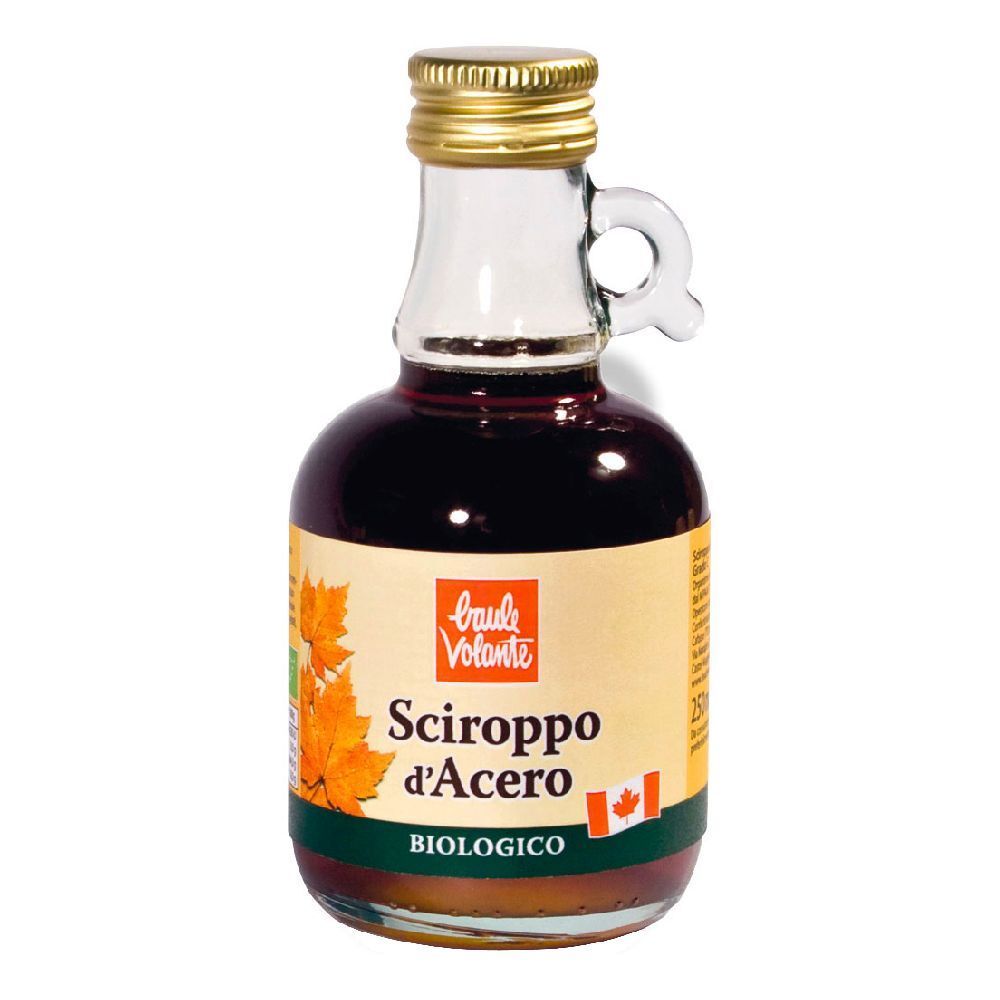 Bottiglia in vetro di sciroppo d'acero. Etichetta con testo, foglie d'acero e bandiera canadese. Tappo dorato e manico.