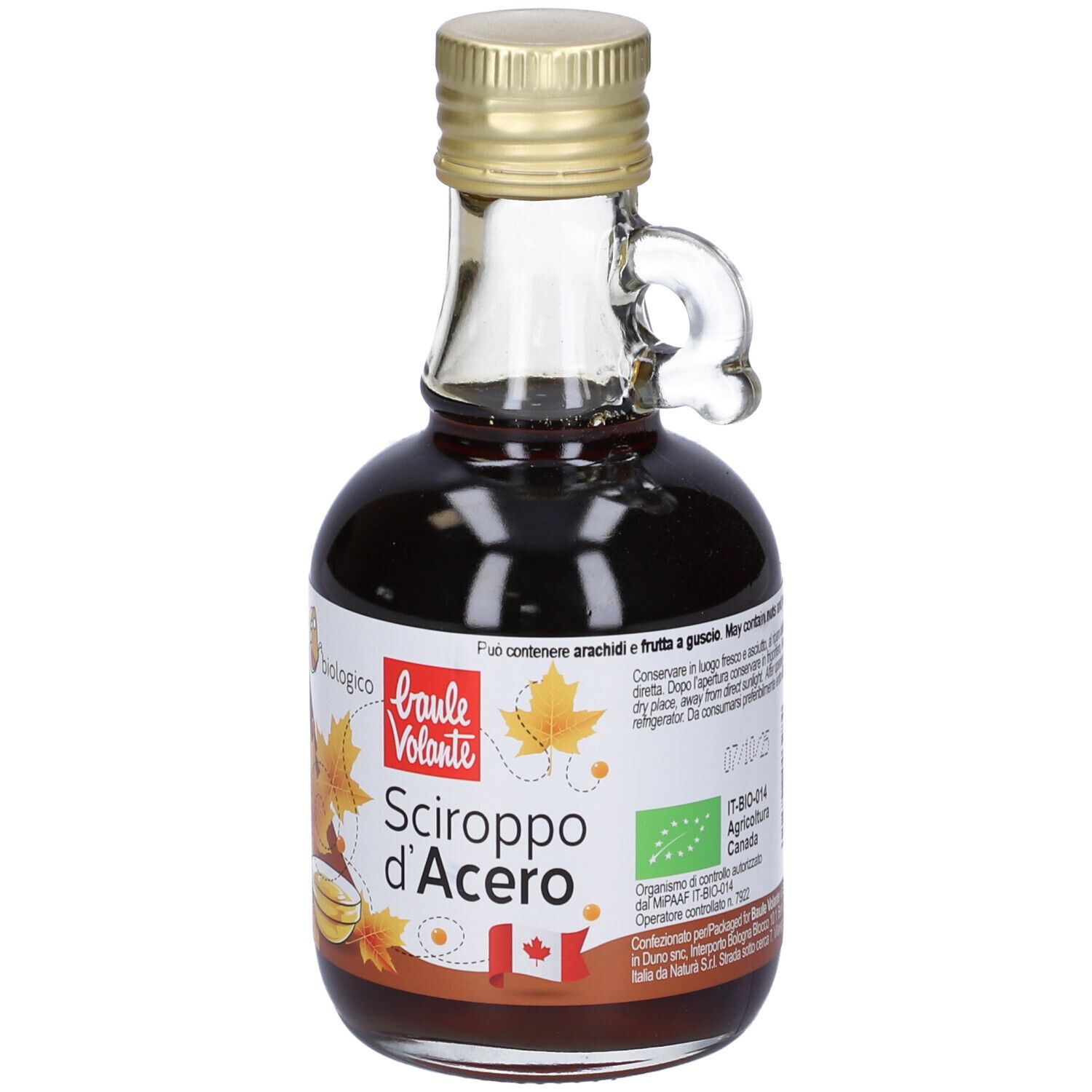 Bottiglia in vetro di sciroppo d'acero. Etichetta con testo, foglie d'acero e bandiera canadese. Tappo dorato e manico.