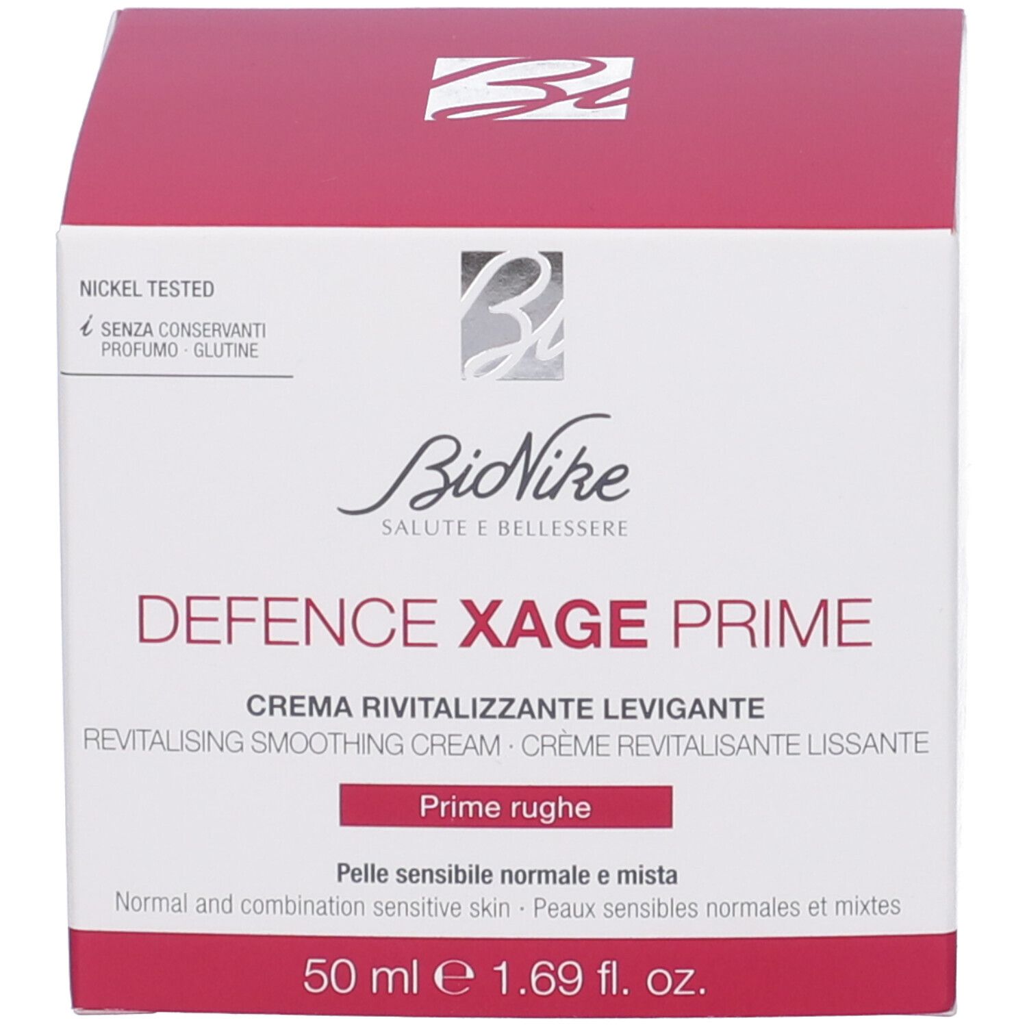 Produktverpackung. Aufschrift: BioNike, Defence Xage Prime, Creme Revitalisante Levigante. 50 ml. Rote und weiße Verpackung.