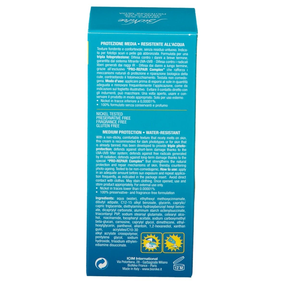 Dos de la boîte de crème solaire. Texte: Protection moyenne, résistant à l'eau. Ingrédients et instructions. Testé au nickel, sans parfum ni gluten.