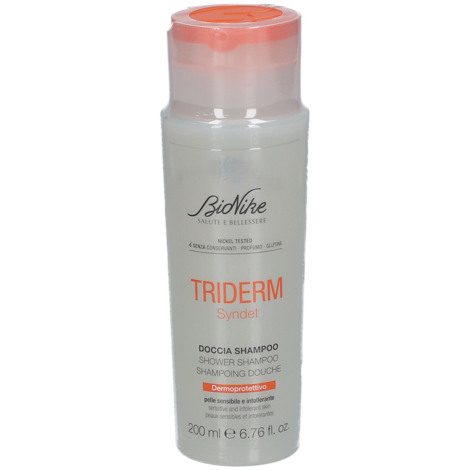 BioNike Triderm Syndet Dusch-Shampoo. Weiße Flasche mit orangefarbenem Deckel. Produktname und Marke deutlich sichtbar.