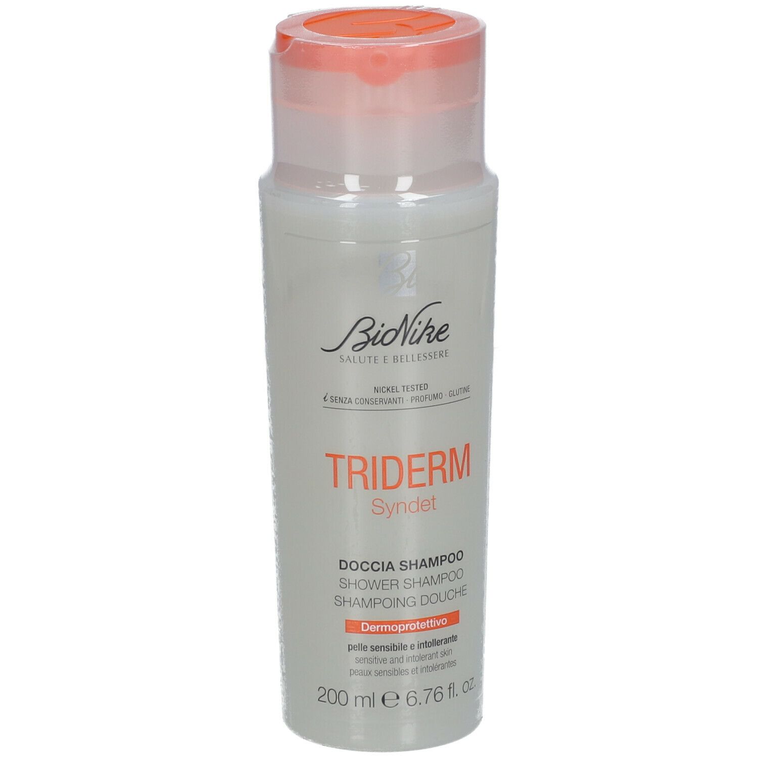 BioNike Triderm Syndet Dusch-Shampoo. Weiße Flasche mit orangefarbenem Deckel. Produktname und Marke deutlich sichtbar.