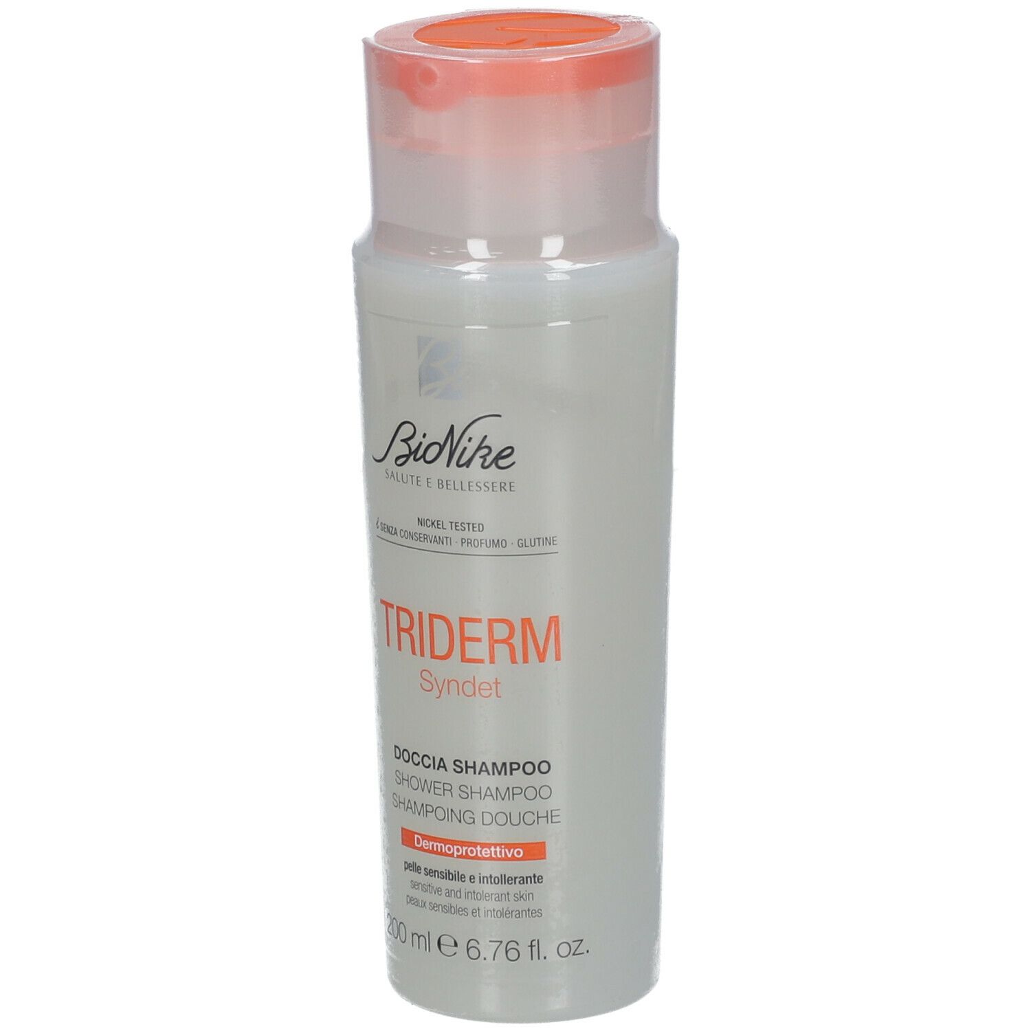 BioNike Triderm Syndet Dusch-Shampoo. Weiße Flasche mit orangefarbenem Deckel. Produktname und Marke deutlich sichtbar.