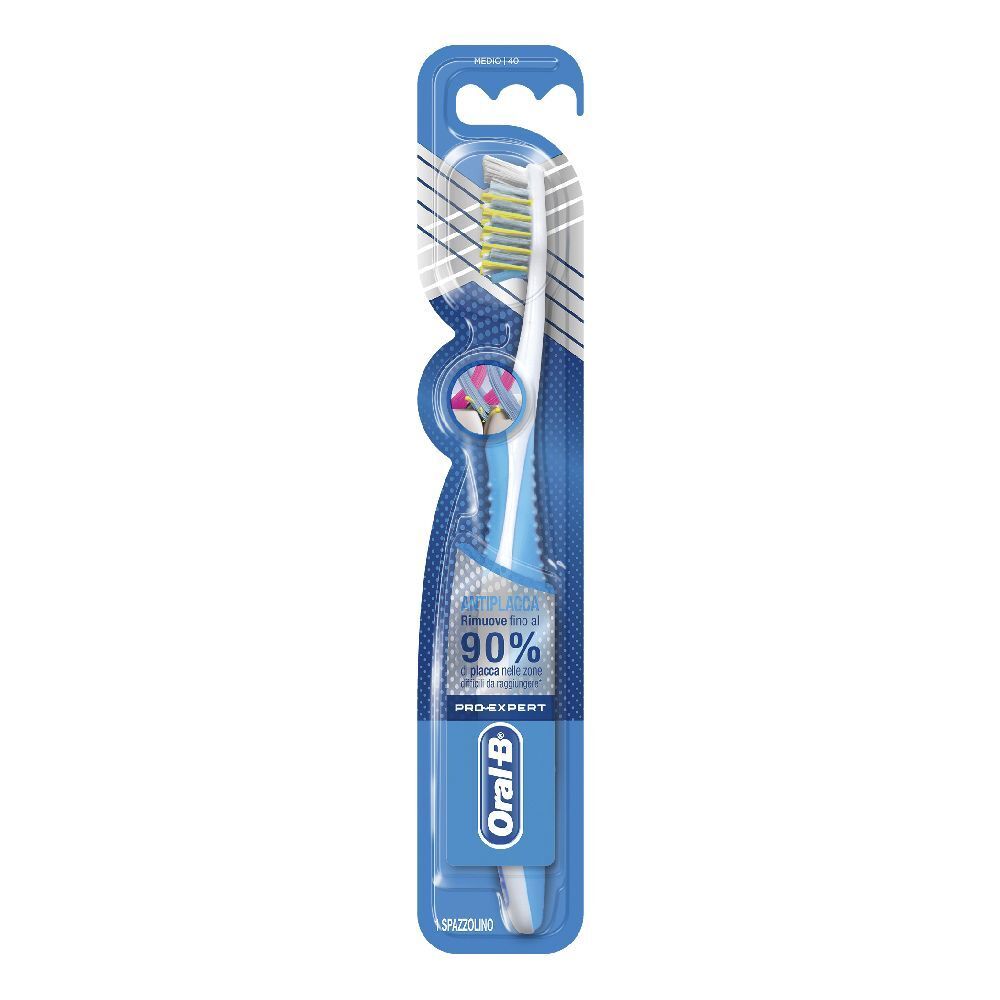 Spazzolino in confezione blister. Confezione blu con spazzolino bianco. Setole gialle e bianche. Logo Oral-B Pro-Expert.