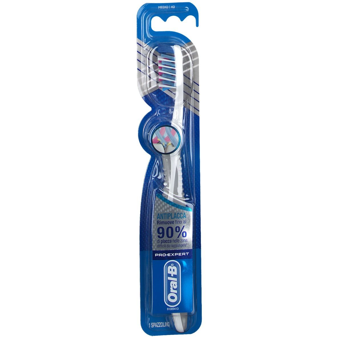 Spazzolino in confezione blister. Confezione blu con spazzolino bianco. Setole rosse e bianche. Logo Oral-B Pro-Expert.