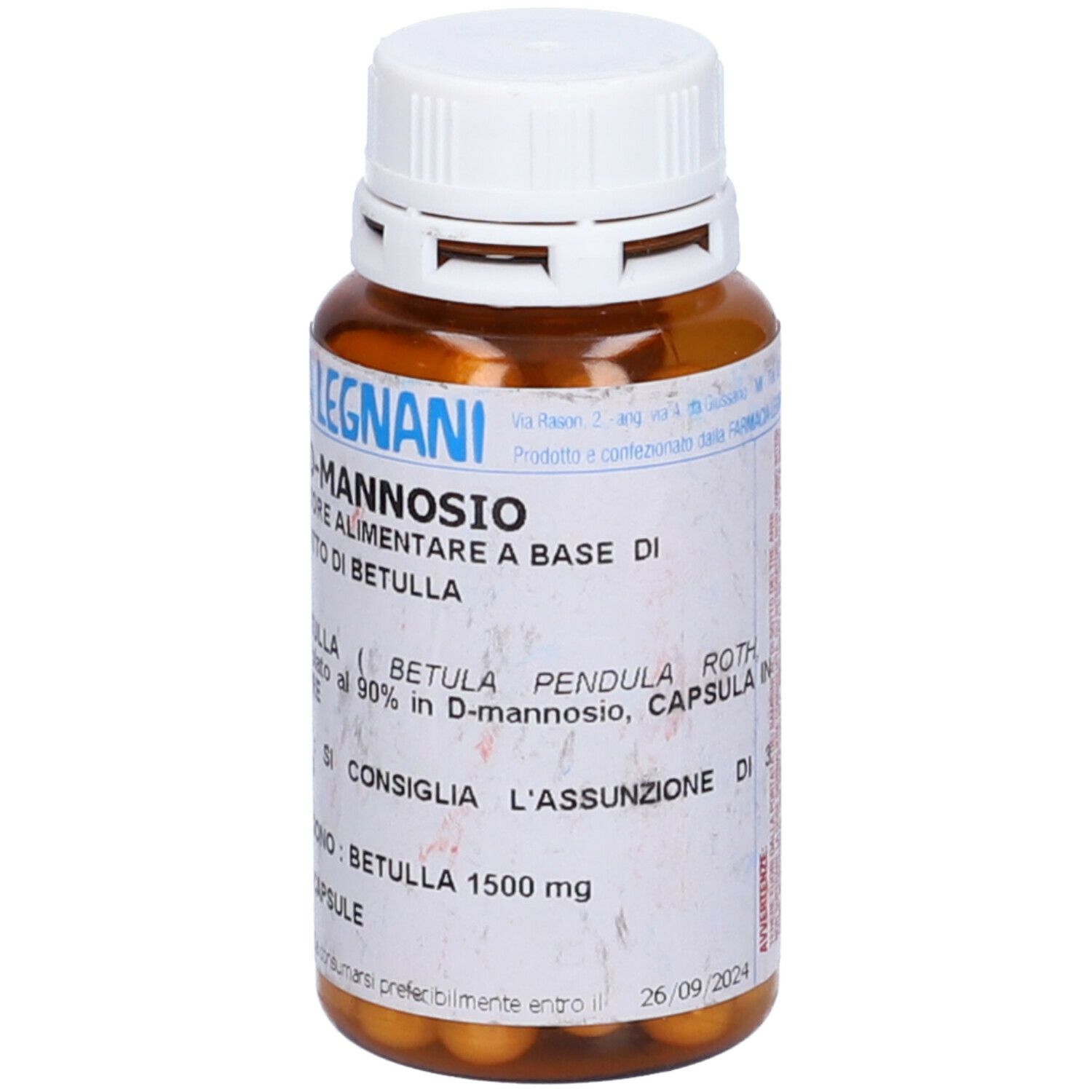 Capsule marroni in un flacone marrone con tappo bianco. Scritta: D-Mannosio, Farmacia Legnani.