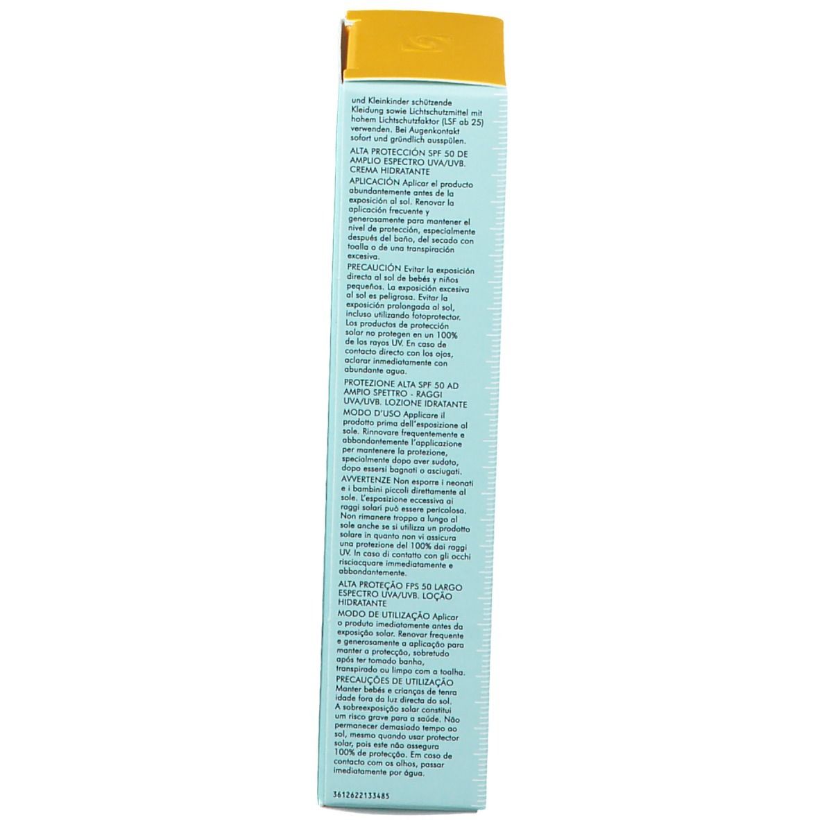 Retro della scatola azzurra. Testo multilingue. Nome prodotto: "Ultra Facial Defense Sunscreen".