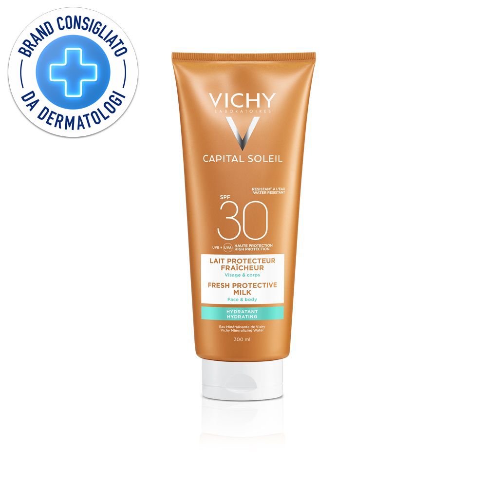 Tubo di latte solare arancione con tappo bianco. Scritta: VICHY Capital Soleil SPF 30. Logo: Brand Consigliato da Dermatologi.