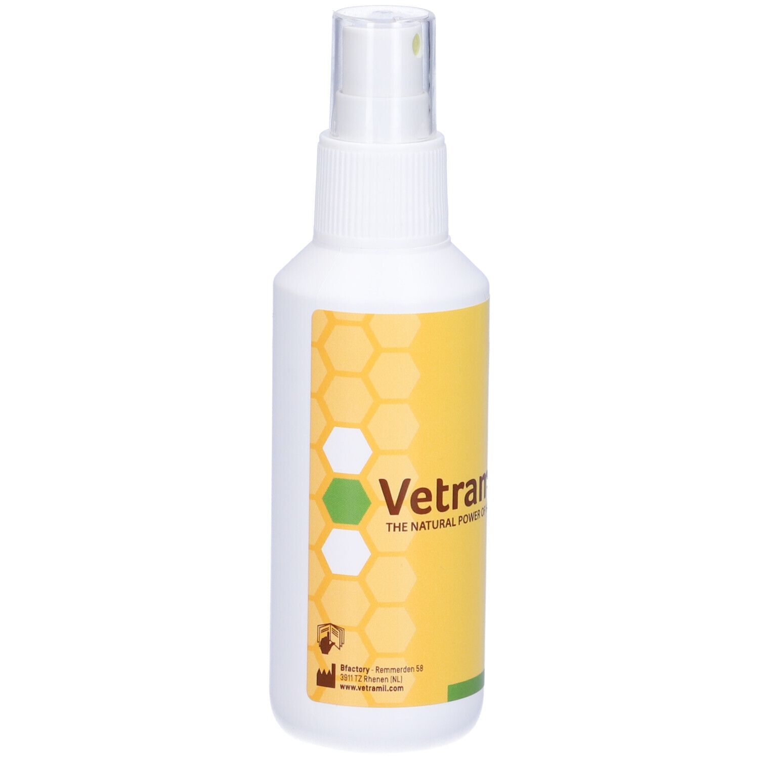 Flacone spray bianco con etichetta gialla. Scritta: Vetramil. Design a nido d'ape. Testina spray trasparente.
