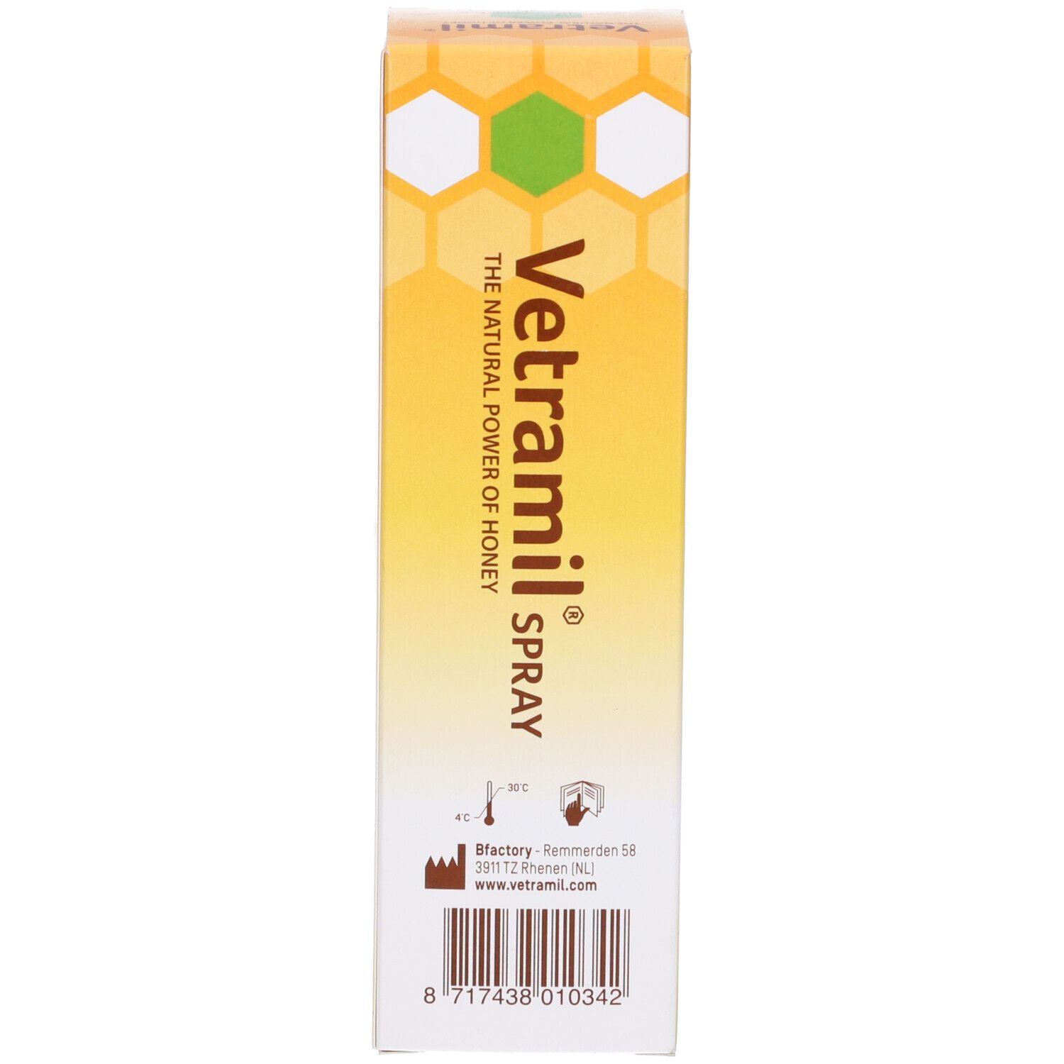 Confezione. Scritta: Vetramil Spray. Design a nido d'ape. Informazioni sul prodotto e logo.