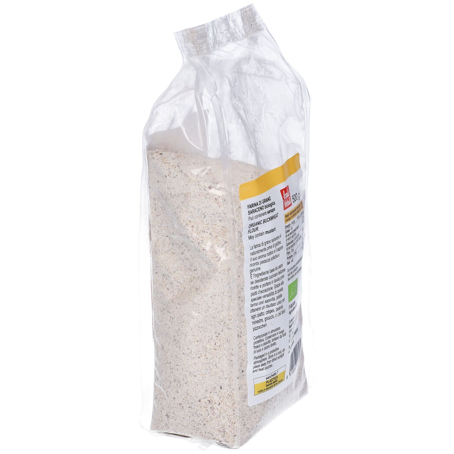 Sacchetto trasparente di farina. Scritta: Farina di grano saraceno, Senza glutine. Logo: Baule Volante.