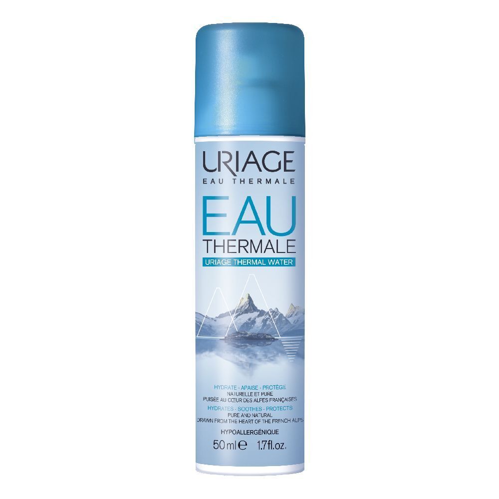Flacon spray cylindrique bleu et blanc. Inscription: URIAGE EAU THERMALE. Illustration: paysage montagneux. Contenance: 50ml.