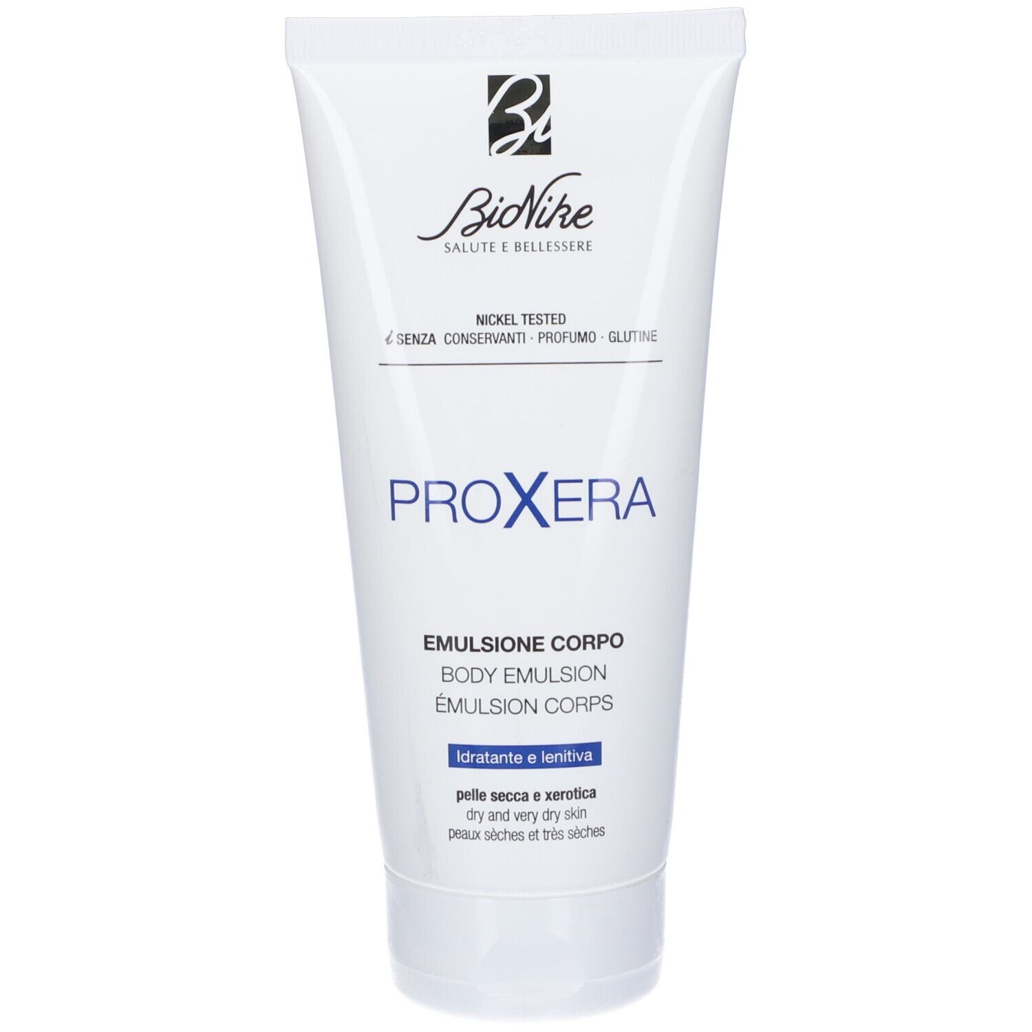 Tubo bianco con testo blu. Scritta: Bionike, Proxera, Emulsione Corpo, per pelli secche.