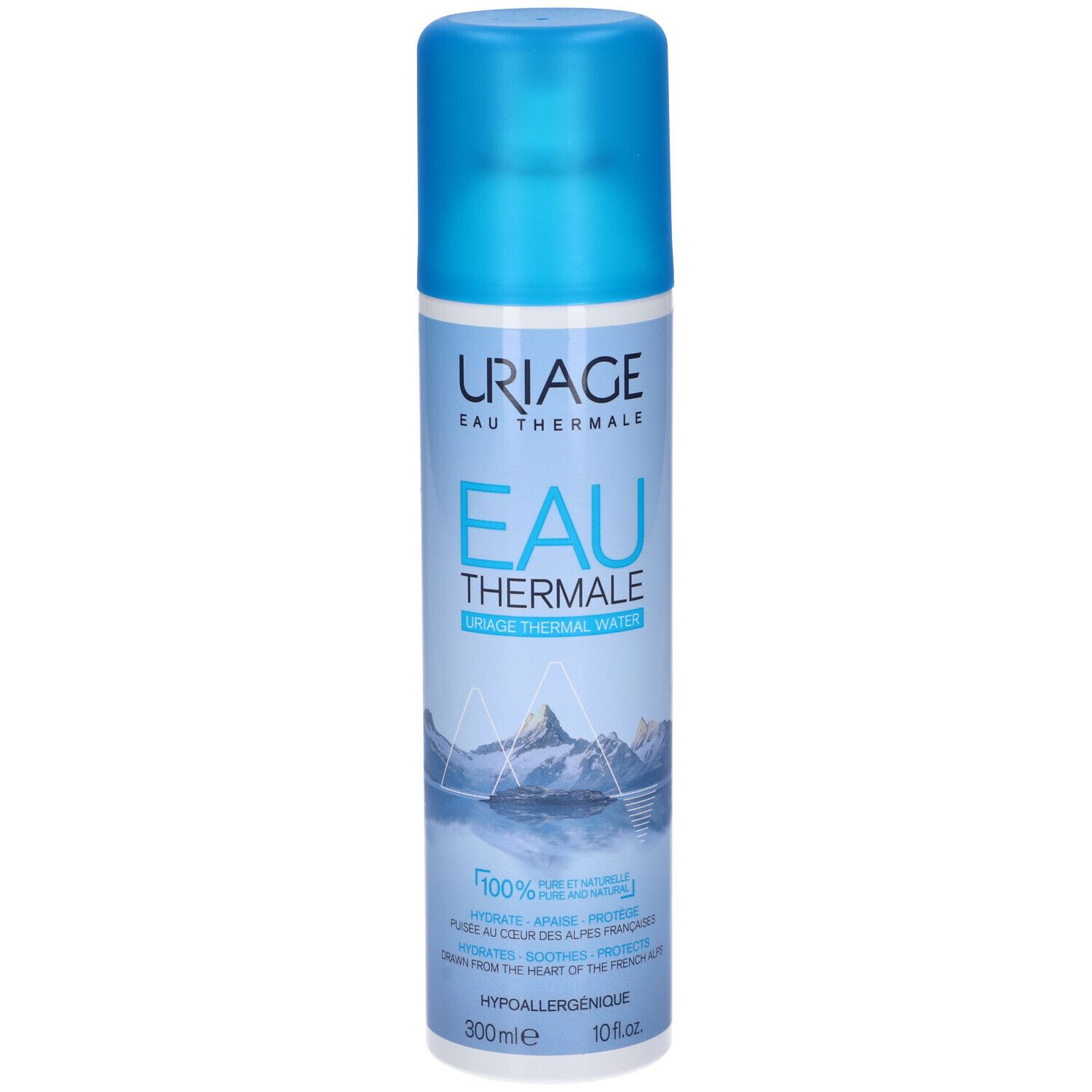 Spray Uriage Eau Thermale. Flacone blu con etichetta bianca. Montagne e testo.