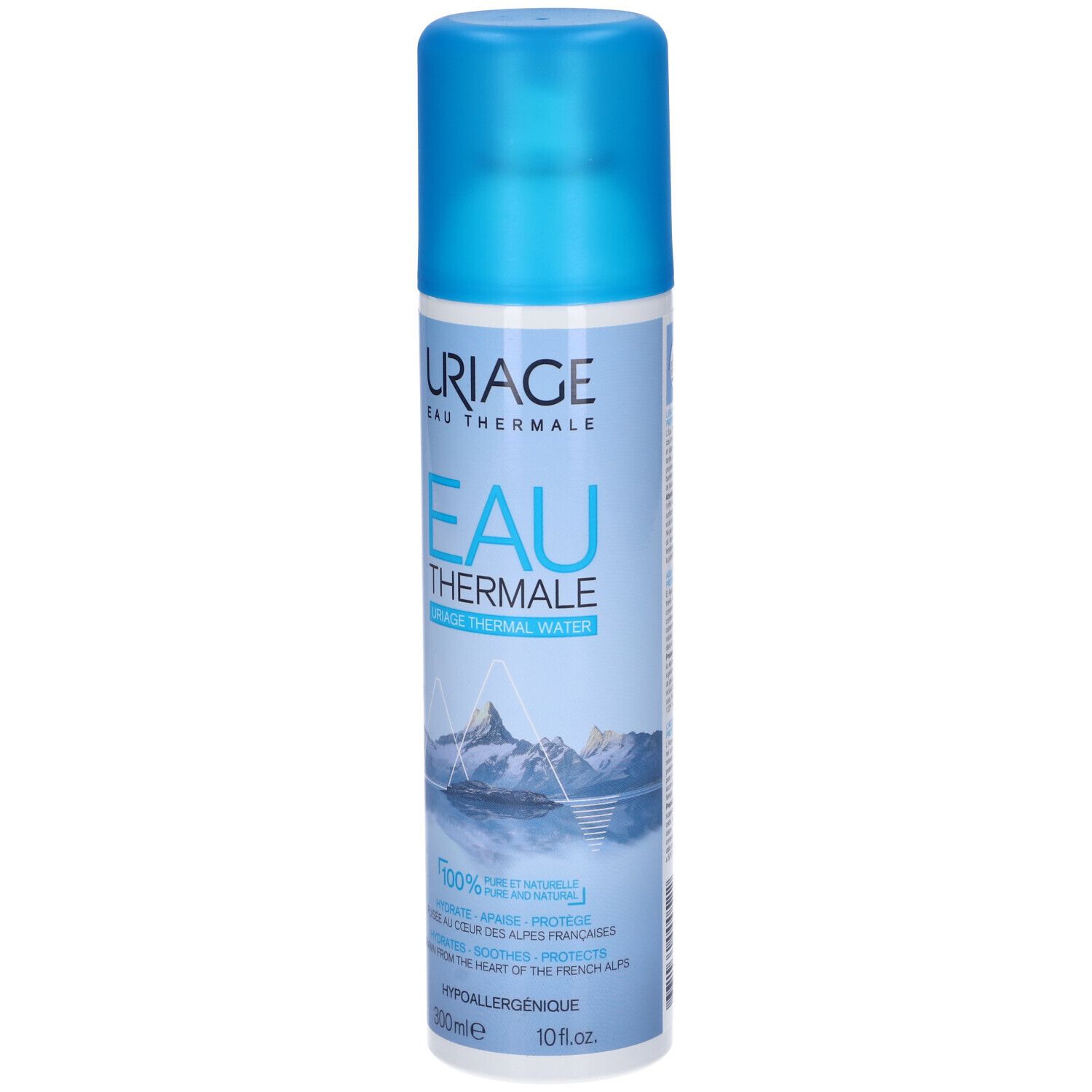 Spray Uriage Eau Thermale. Flacone blu con etichetta bianca. Montagne e testo.