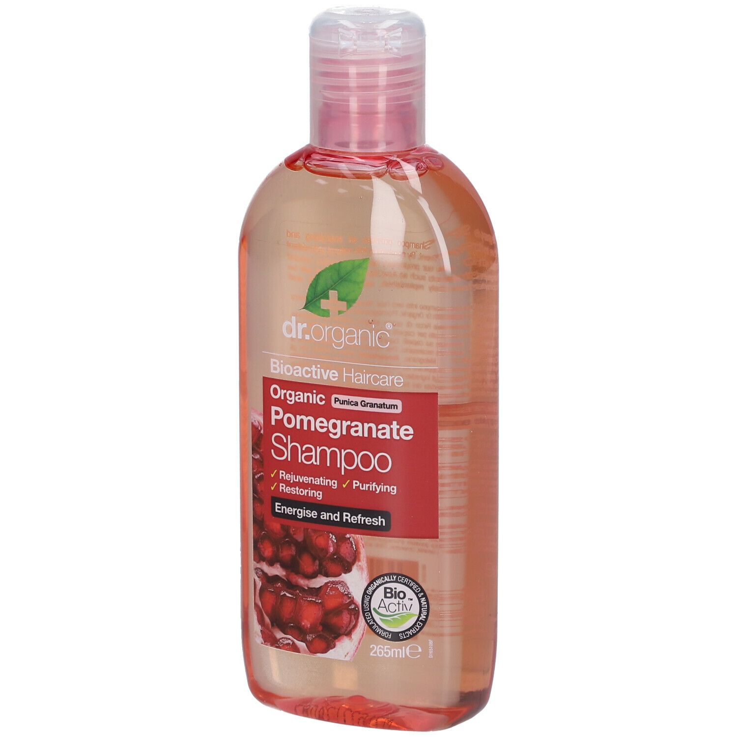 Flacone di shampoo con tappo rosa. Scritta: Dr. Organic Bio-Granatapfel-Shampoo. Liquido rosso e trasparente.