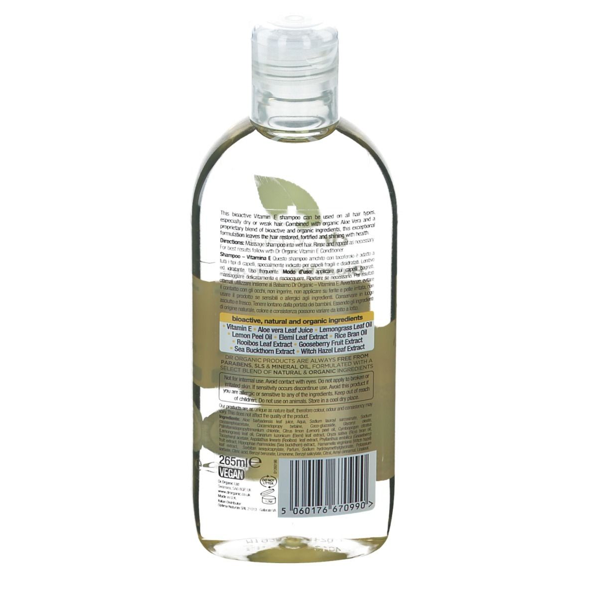 Retro della bottiglia di shampoo Dr. Organic Bio-Vitamina E. Bottiglia trasparente con liquido giallo. Testo.