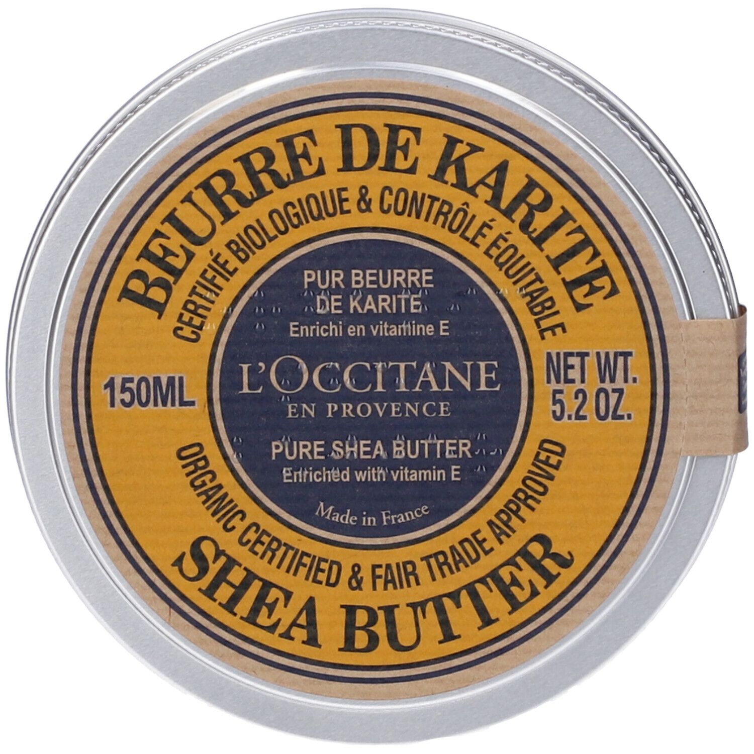 Contenitore rotondo con scritta "BEURRE DE KARITÉ". Etichetta gialla con testo e logo. Visibili "L'OCCITANE" e "SHEA BUTTER".