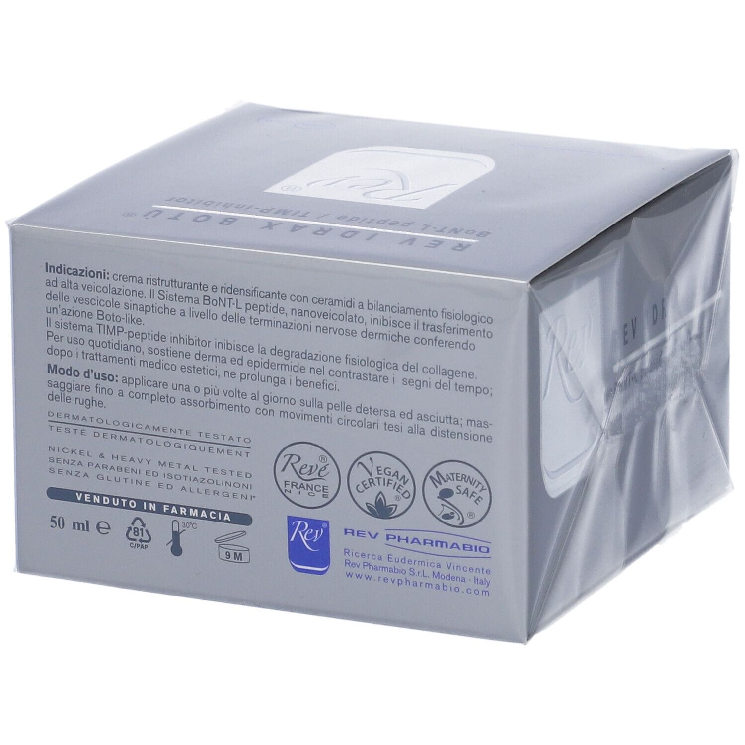 Graue Verpackung mit Produktinformationen. Text: REV IDRAX BOTÙ. Logo Rev. Zertifizierungen und Hinweise.