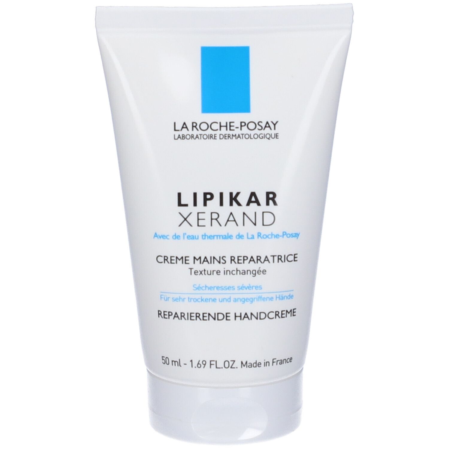 Tubo bianco con logo blu. Scritta: LIPIKAR XERAND. Crema mani riparatrice. Senza parabeni.