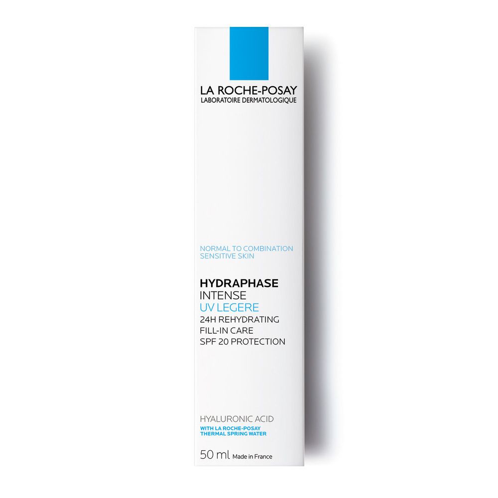 Weiße Verpackung mit blauem Streifen. Aufschrift: La Roche-Posay, Hydraphase UV Legere, SPF 20. Mit blauem Quadrat.