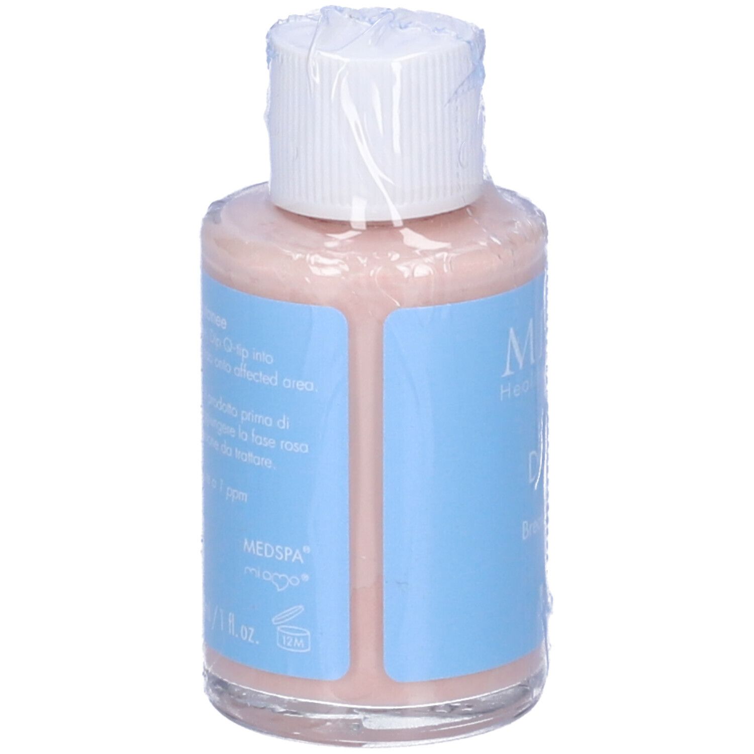 Flacone trasparente con tappo bianco, confezionato. Scritte: Miamo, Dry Spot, Breakout corrector, acnever.