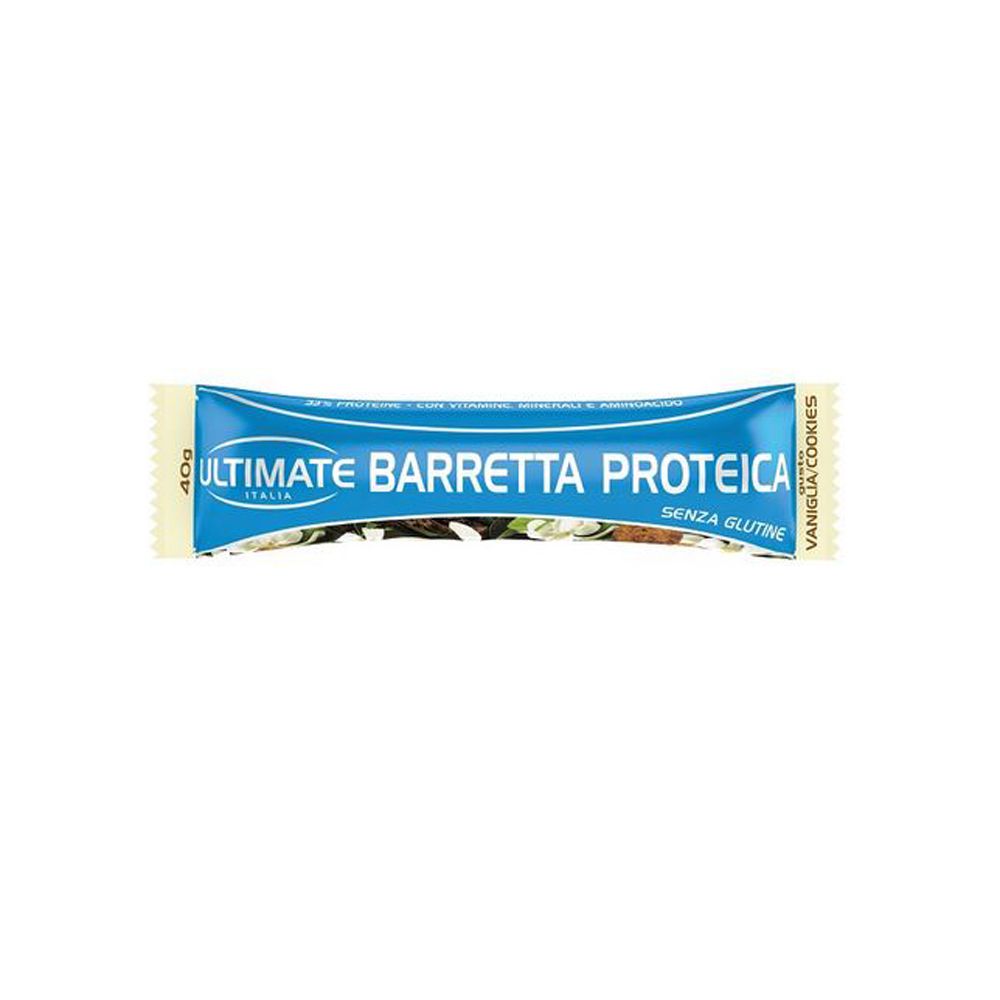 Barretta proteica, confezione blu e bianca. Testo: Ultimate Barretta Proteica, Vaniglia Cookies, Senza Glutine. 40g.