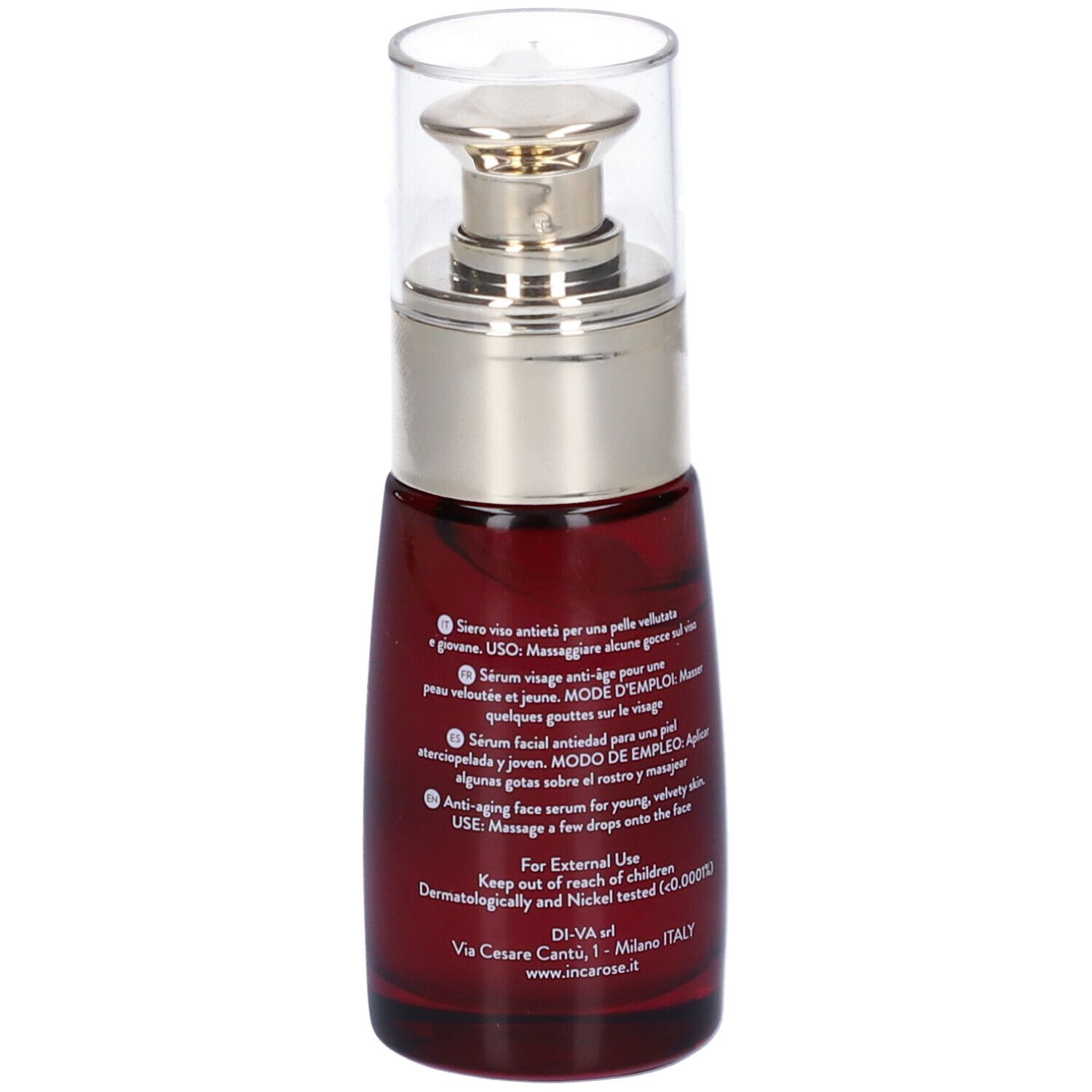 Rote Glasflasche mit silbernem Pumpkopf. Rückseite mit Text in mehreren Sprachen, darunter Anwendungsanweisungen.