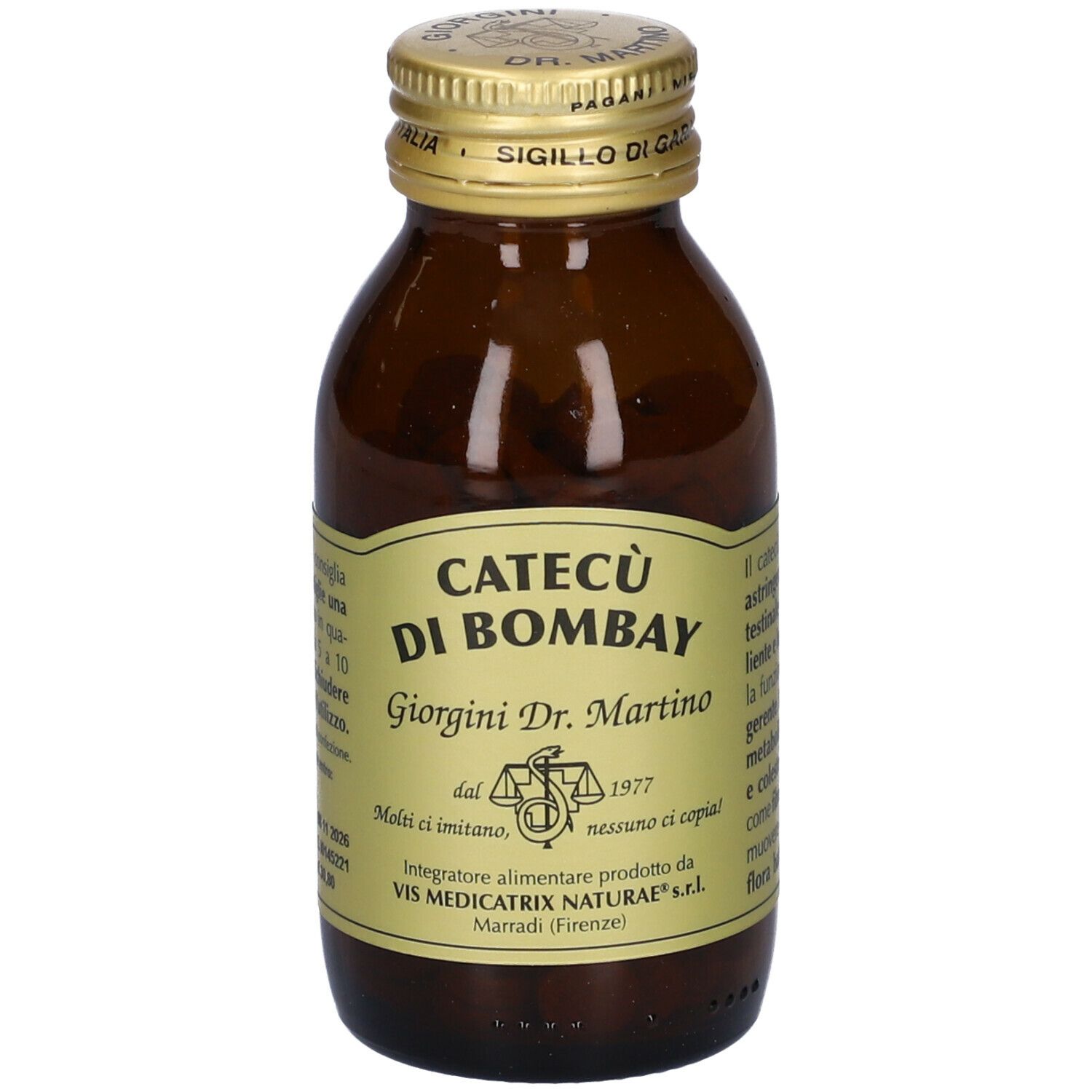 Flacone in vetro marrone con tappo dorato. Etichetta con testo. Contenuto 90g.