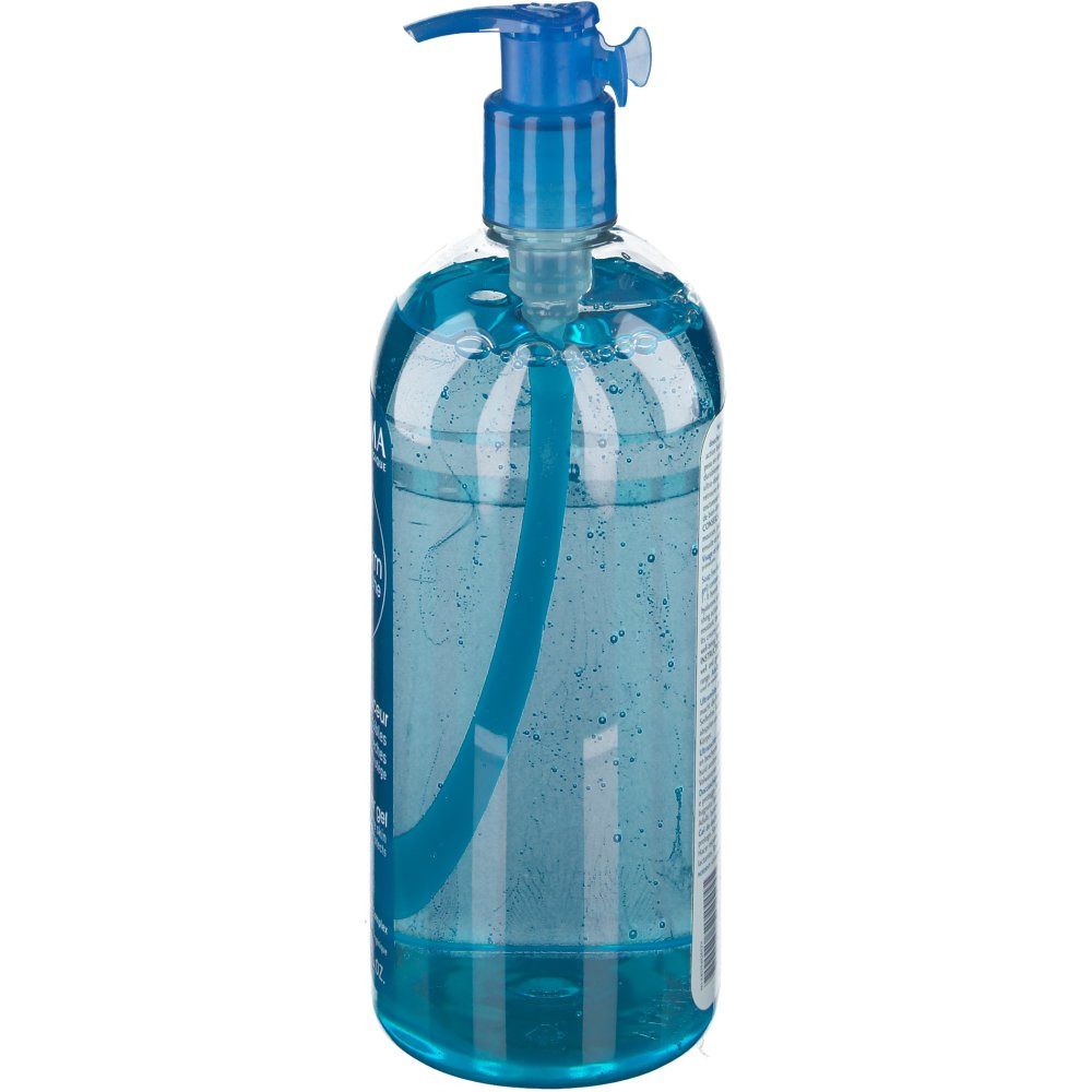 Flacone blu trasparente con dosatore. Liquido blu visibile. Testo sul lato.