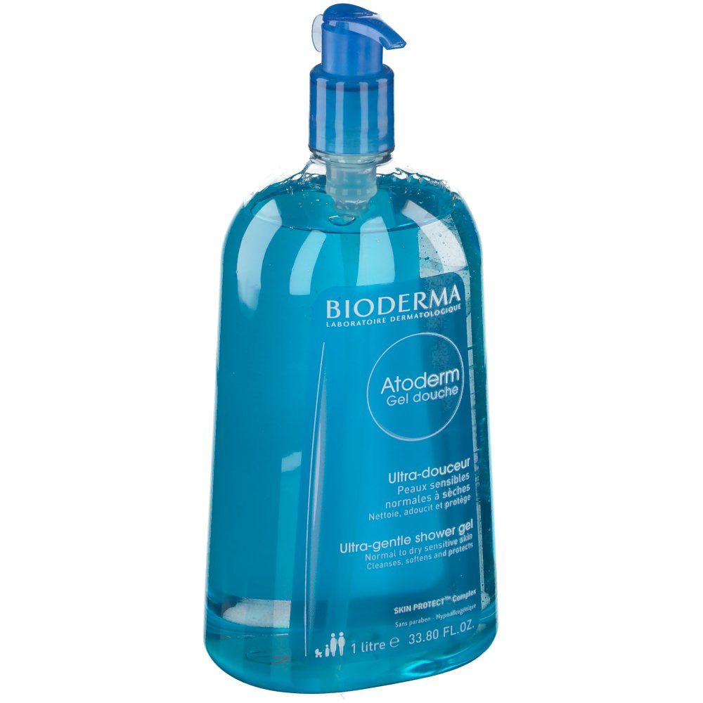 Flacone blu trasparente con dosatore. Scritta: BIODERMA, Atoderm Gel douche. Ultra-douceur. Per pelli sensibili.