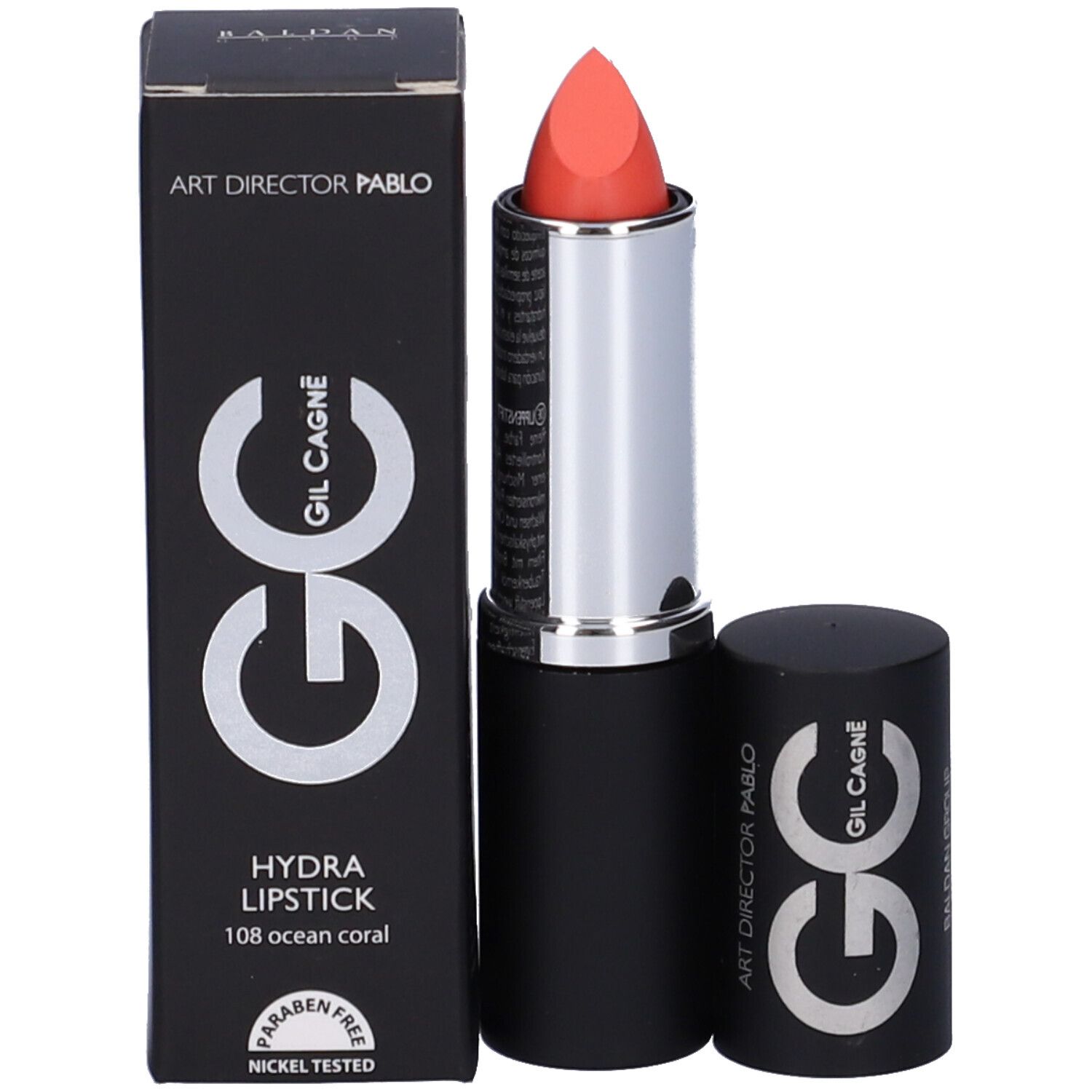 Rossetto corallo. Stick nero con anello argentato. Confezione accanto.