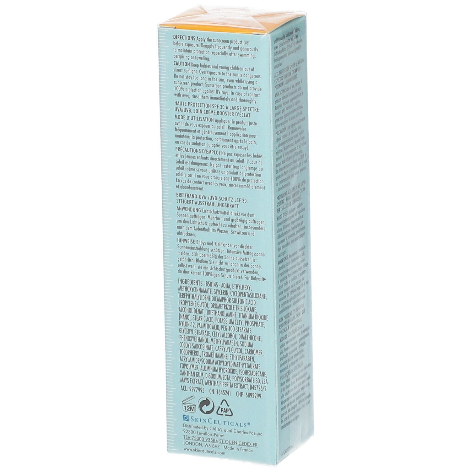 Retro della scatola azzurra. Testo in più lingue. Angolo giallo con SPF 30. Informazioni sul prodotto.