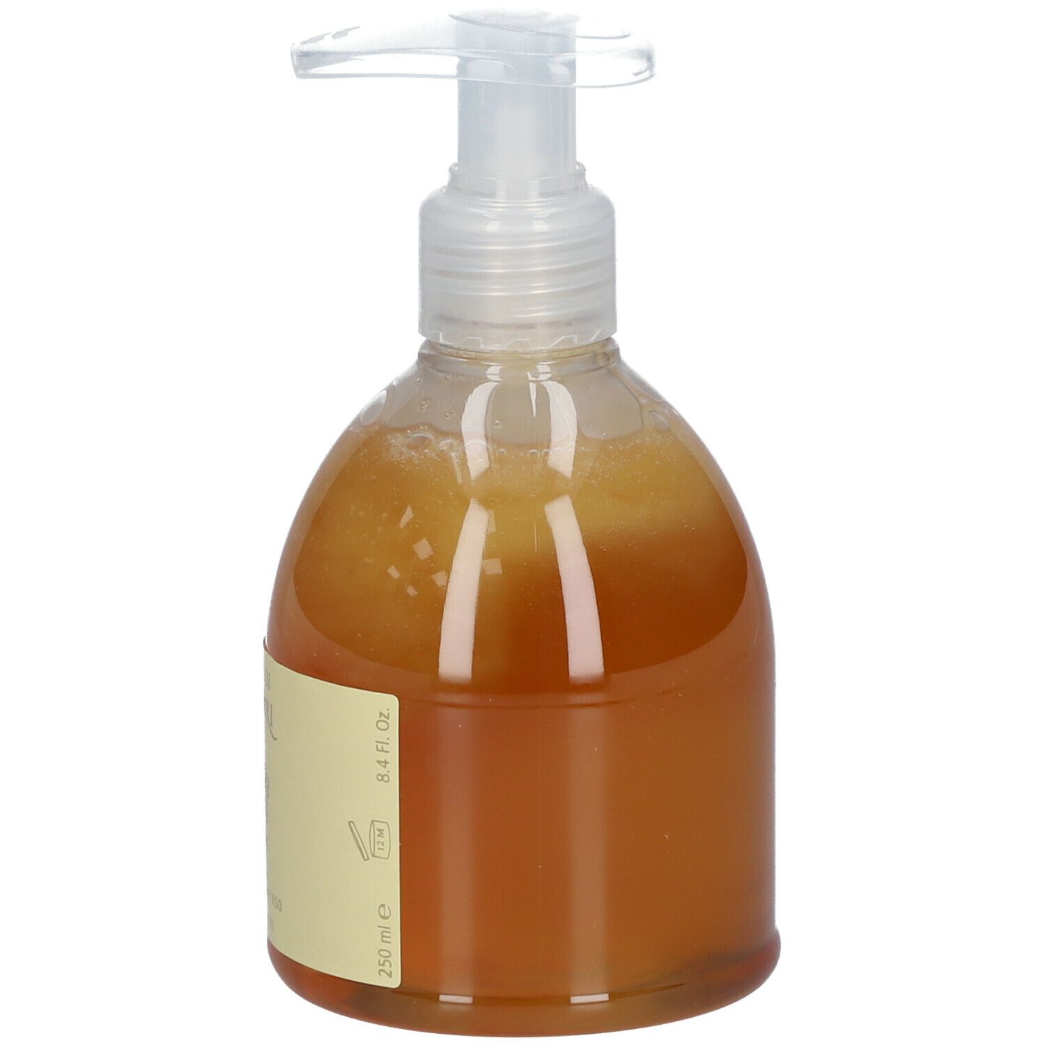 Sapone liquido in flacone trasparente con dosatore. Vista laterale, etichetta visibile.