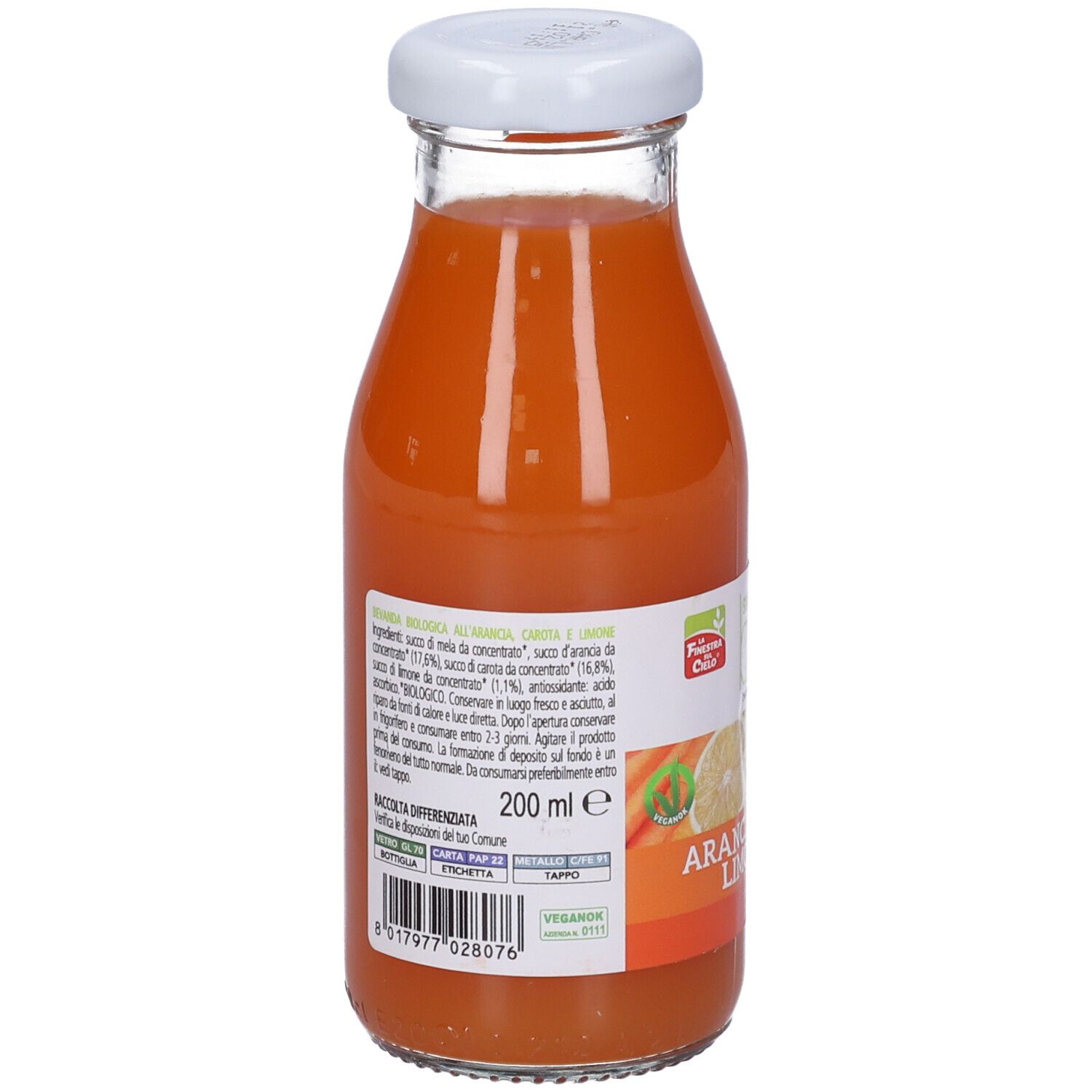 Bottiglia di vetro con tappo bianco. Retro con elenco ingredienti e informazioni nutrizionali. Contenuto arancione.