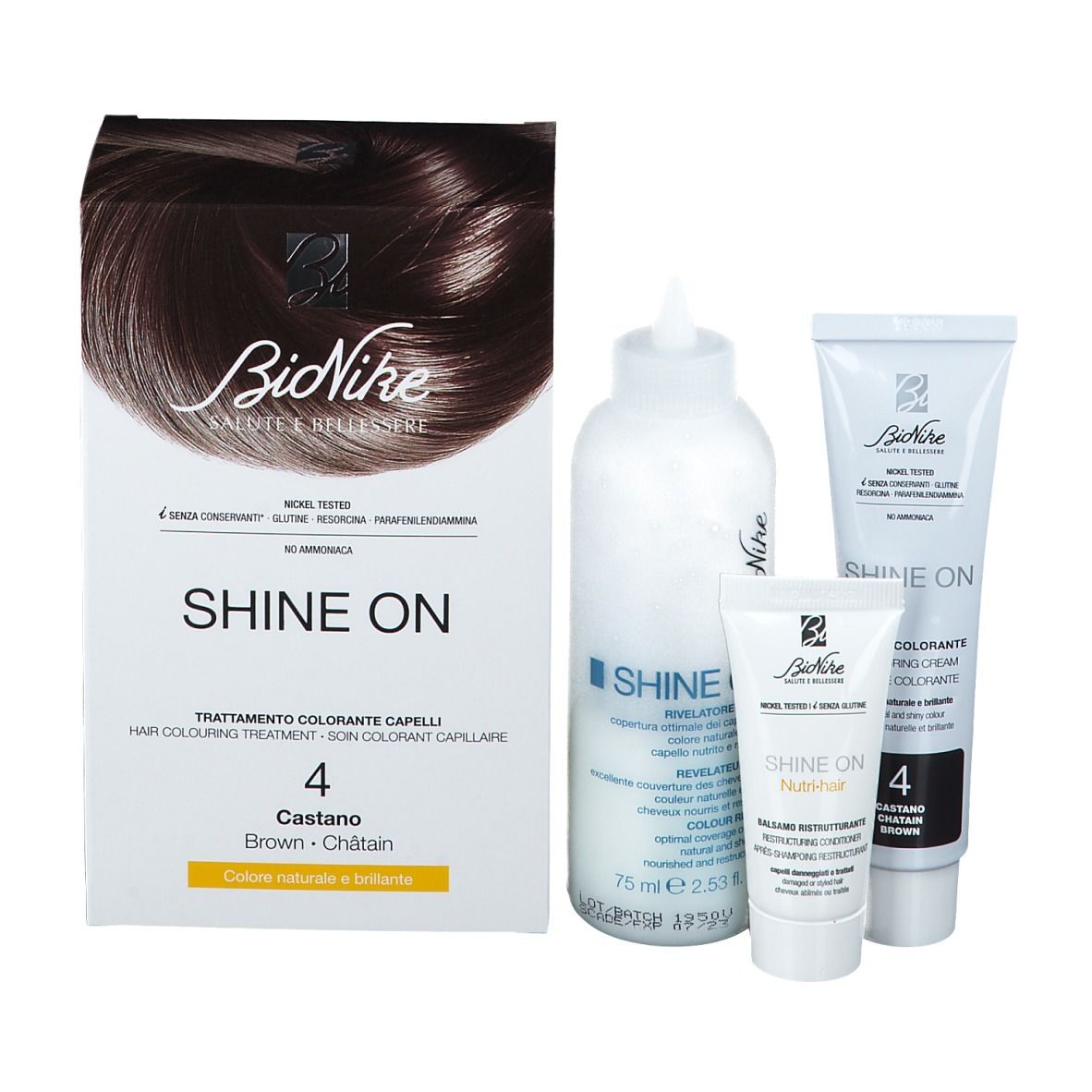 BioNike Shine On, confezione di tintura per capelli e accessori. Include flacone, tubi e confezione. Nome del prodotto e colore ben visibili.