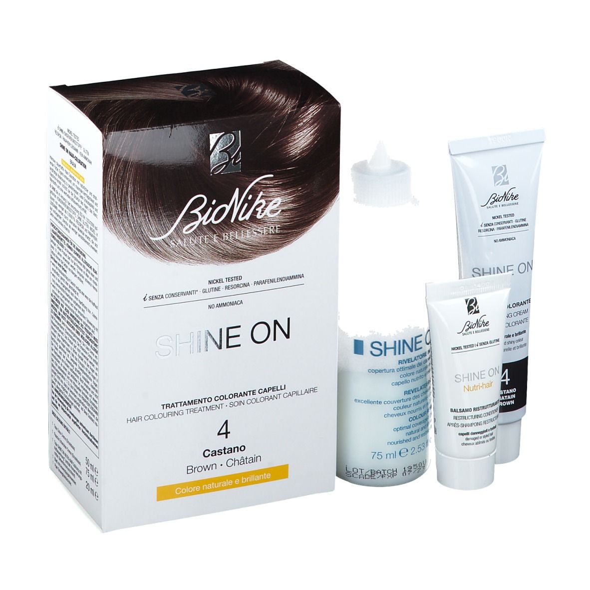 BioNike Shine On, confezione di tintura per capelli e accessori. Include flacone, tubi e confezione. Nome del prodotto e colore ben visibili.