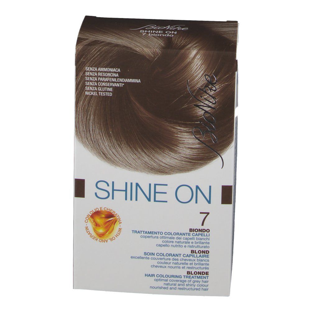 BioNike Shine On Colorante Capelli 7 Biondo. Vorderseite der Verpackung. Aufschrift: Shine On, 7 Biondo. Enthält keine schädlichen Stoffe.