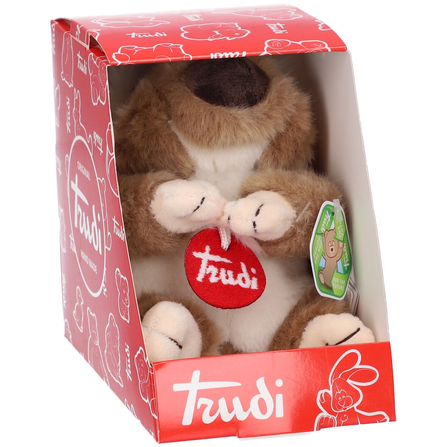 Koala di peluche in confezione rossa Trudi. Il koala è marrone e bianco. Etichetta rossa con logo Trudi.