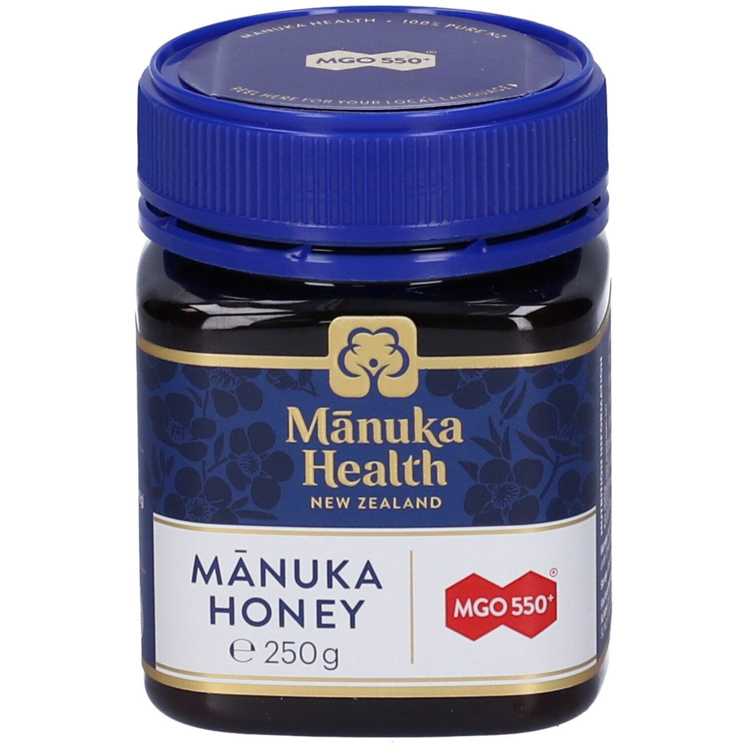 Vasetto di miele di Mānuka. Etichetta blu con logo, MGO 550+ e testo. 250g.