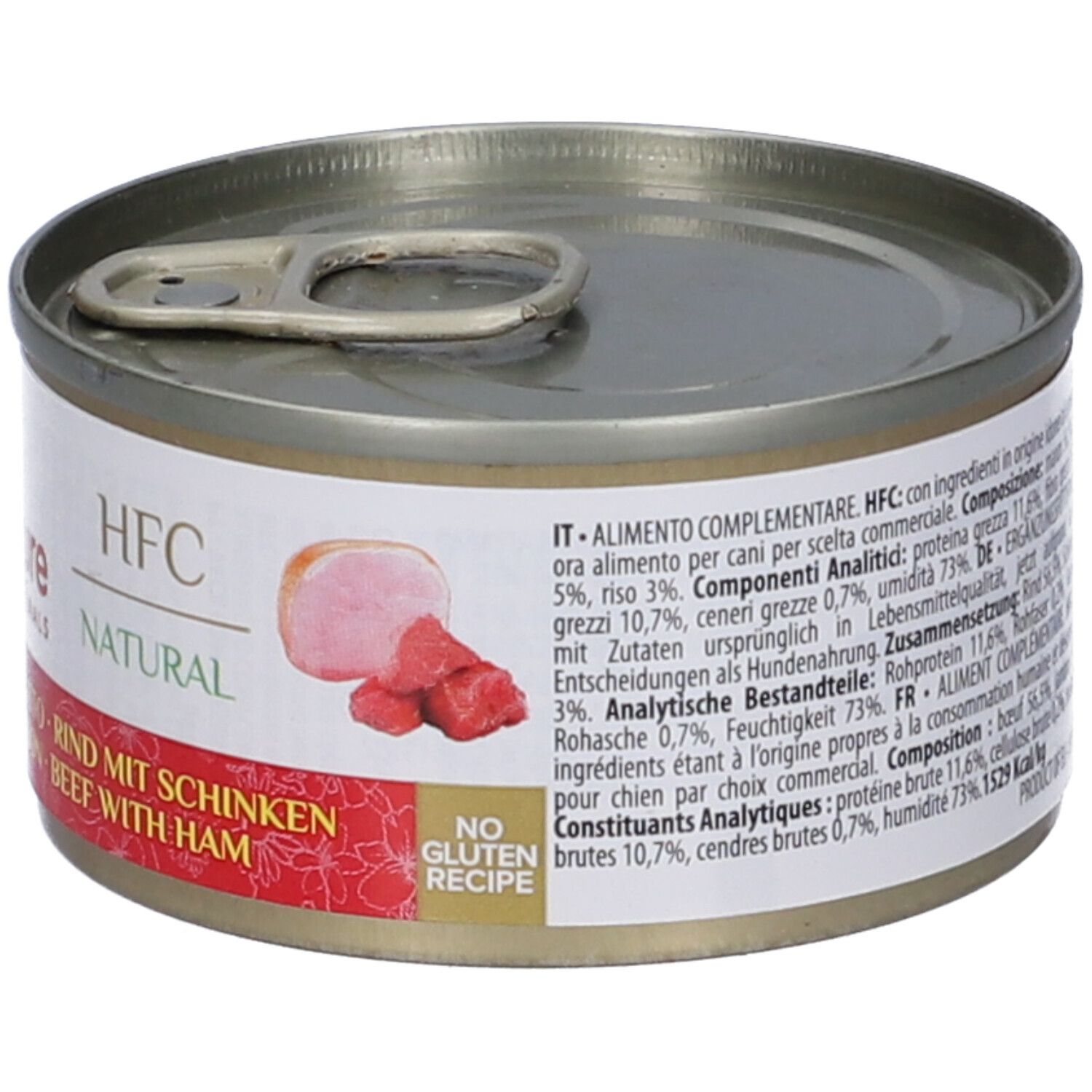 Lattina di cibo per cani Almo Nature HFC. Scritta: Manzo con Prosciutto, Rind mit Schinken, Beef with Ham. Lattina con pezzo di carne e testo.