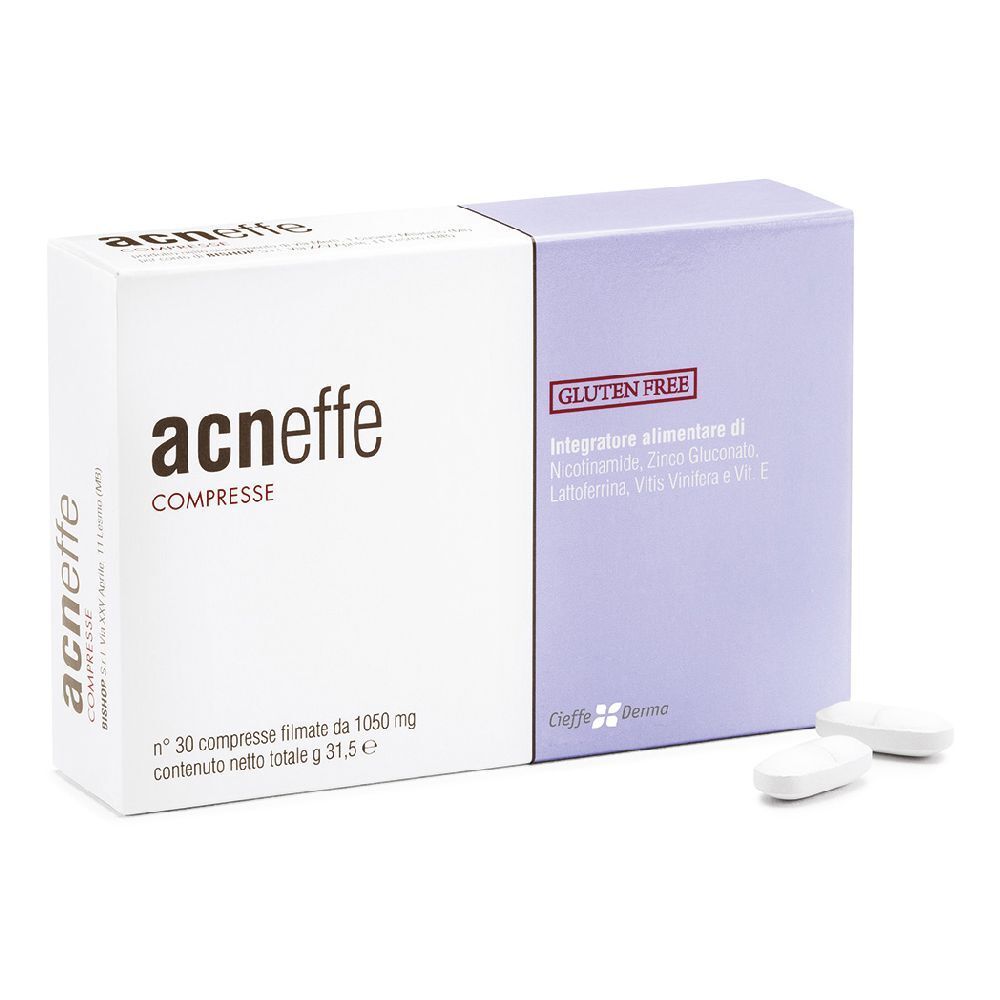 Scatola di compresse "acneffe COMPRESSE". Due compresse accanto. Senza glutine.