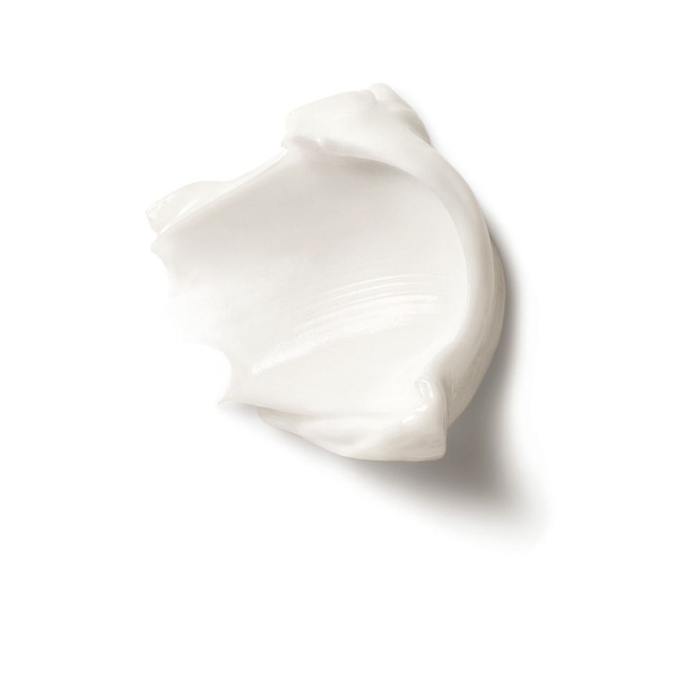 Macchia di crema bianca su sfondo bianco. Nessuna etichetta.