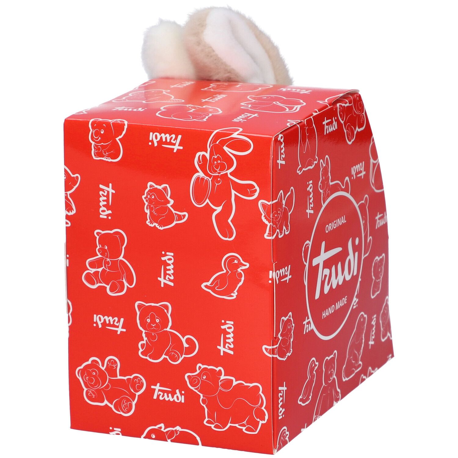 Scatola rossa con orecchie di coniglio di peluche. Sulla scatola c'è scritto "Trudi".
