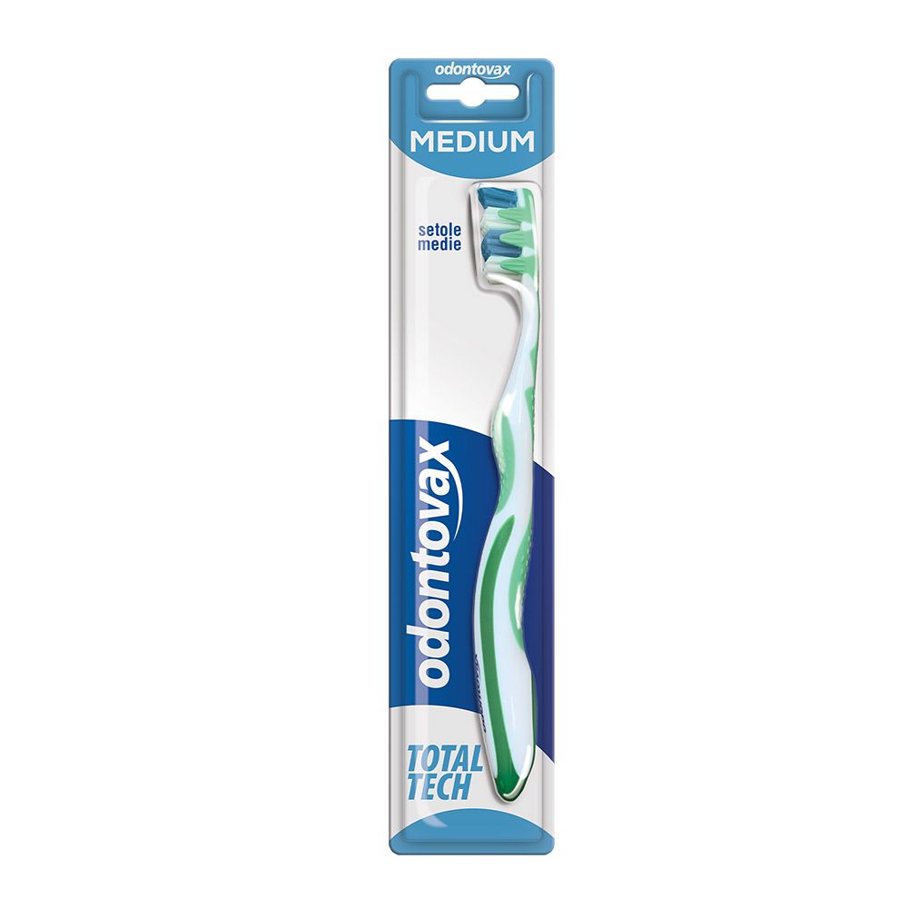 Spazzolino Odontovax Total Tech Medium, verde e bianco. Confezione blister. Gancio blu con nome e "MEDIUM".